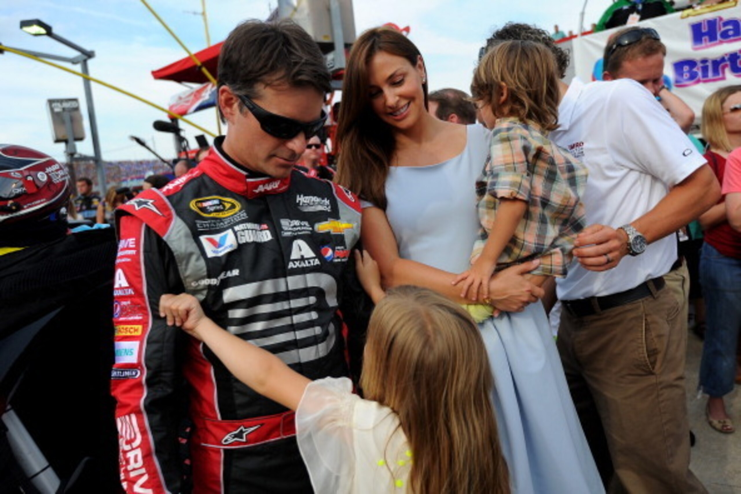 CHARLOTTE, NC - MAY 25:  Jeff Gordon, driver of the #24 Drive To End Hunger Chevrolet, stands on the grid with his wife, Ingrid Vandebosch, daughter, Ella Sophia and son Leo Benjamin, on the grid prior to the NASCAR Sprint Cup Series Coca-Cola 600 at Char