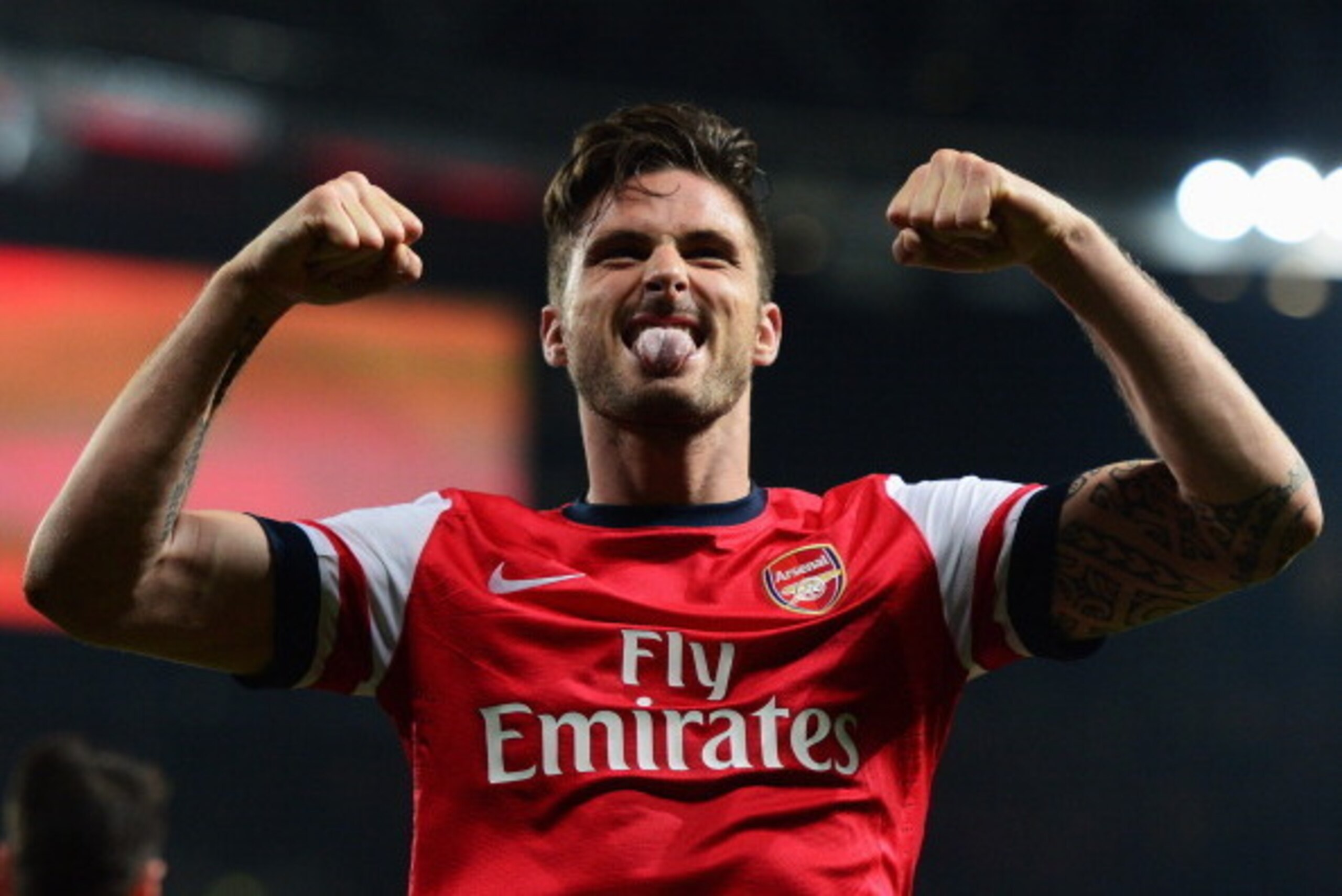 LONDON, ENGLAND - APRIL 28:  Olivier Giroud of Arsenal celebrates as he scores their third goal during the Barclays Premier League match between Arsenal and Newcastle United at Emirates Stadium on April 28, 2014 in London, England.  (Photo by Jamie McDona