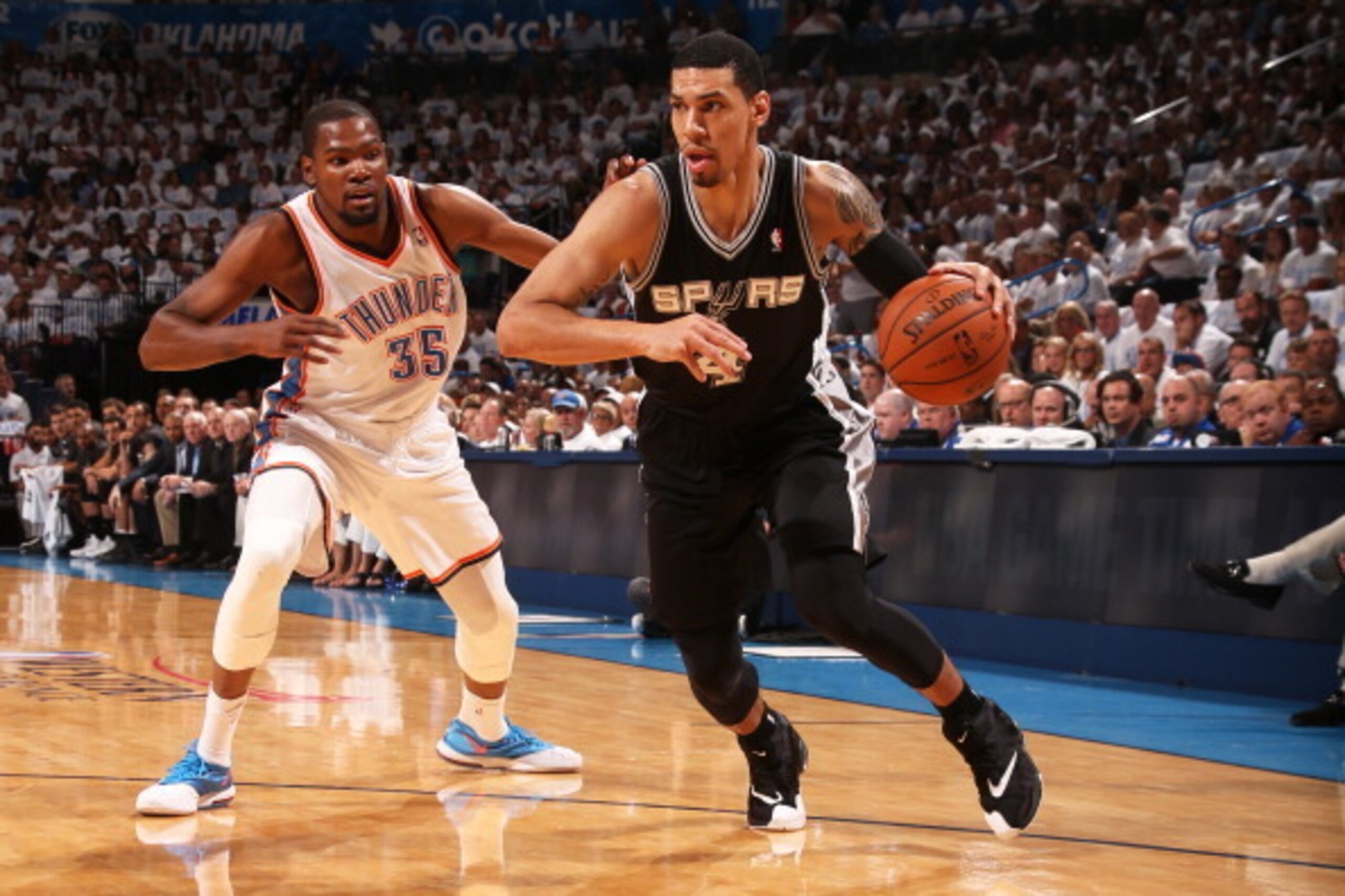 OKLAHOMA CITY, OK  MAY 31: Danny Green #4 of the San Antonio Spurs handles the ball against the Oklahoma City Thunder in Game Six of the Western Conference Finals during the 2014 NBA Playoffs on May 31, 2014 at the Chesapeake Energy Arena in Oklahoma City