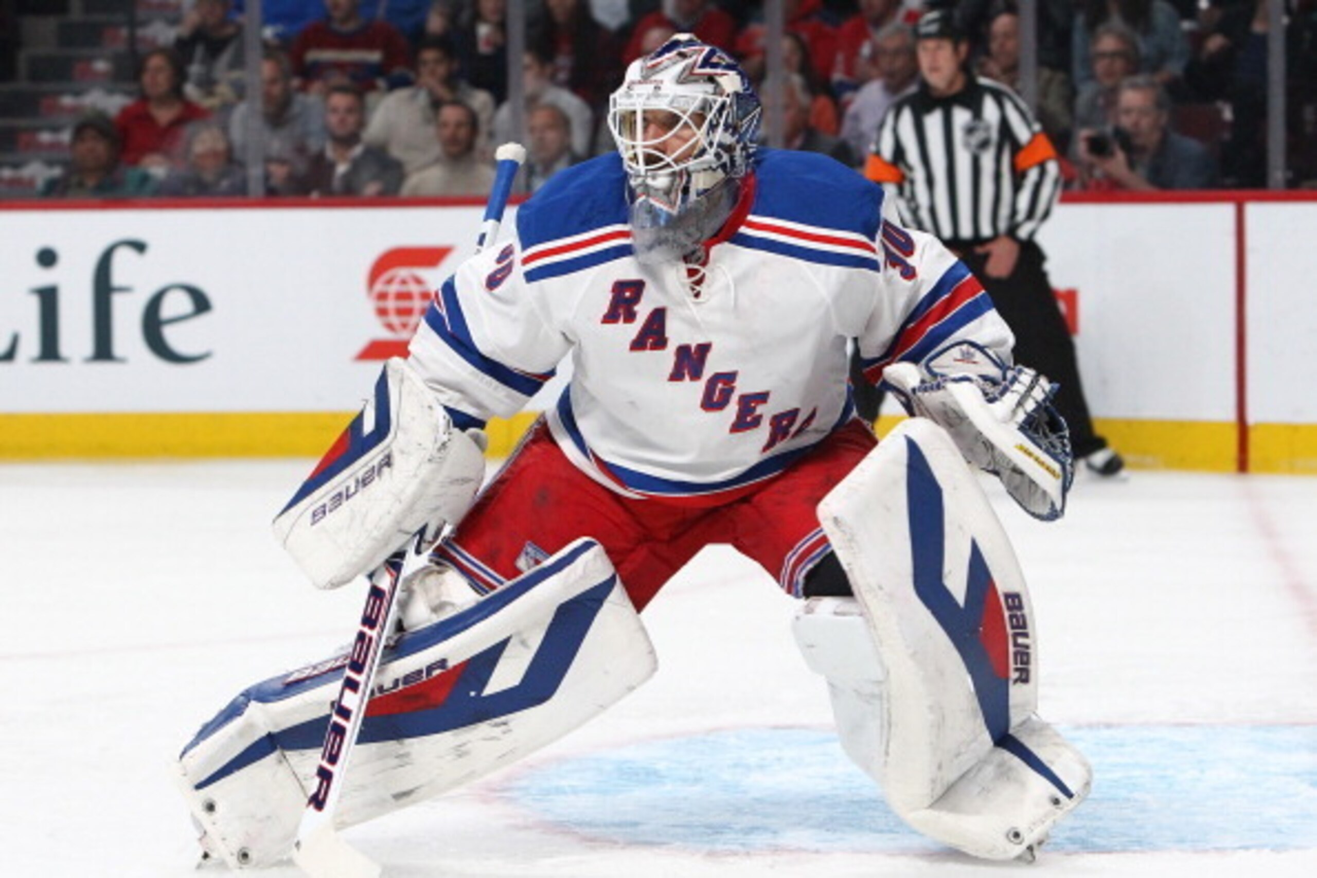 MONTREAL, QC - MAY 27: Henrik Lundqvist #30 of the New York Rangers defends the net against the Montreal Canadiens during Game Five of the Eastern Conference Final in the 2014 NHL Stanley Cup Playoffs at Bell Centre on May 27, 2014 in Montreal, Canada. Ca
