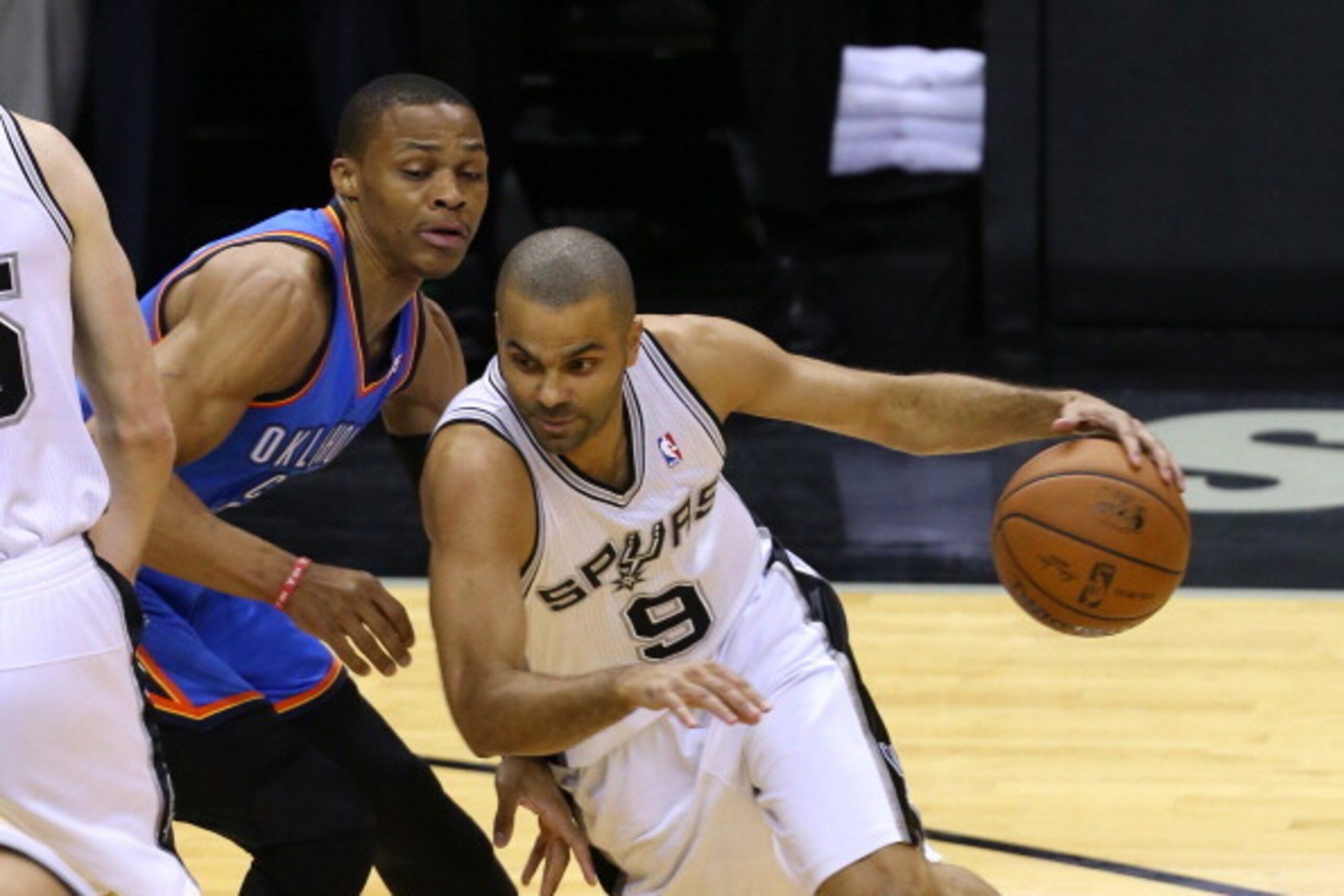 SAN ANTONIO, TX - MAY 29:  Tony Parker #9 of the San Antonio Spurs drives around Russell Westbrook #0 of the Oklahoma City Thunder in Game Five of the Western Conference Finals during the 2014 NBA Playoffs at the AT&T Center on May 29, 2014 in San Antonio