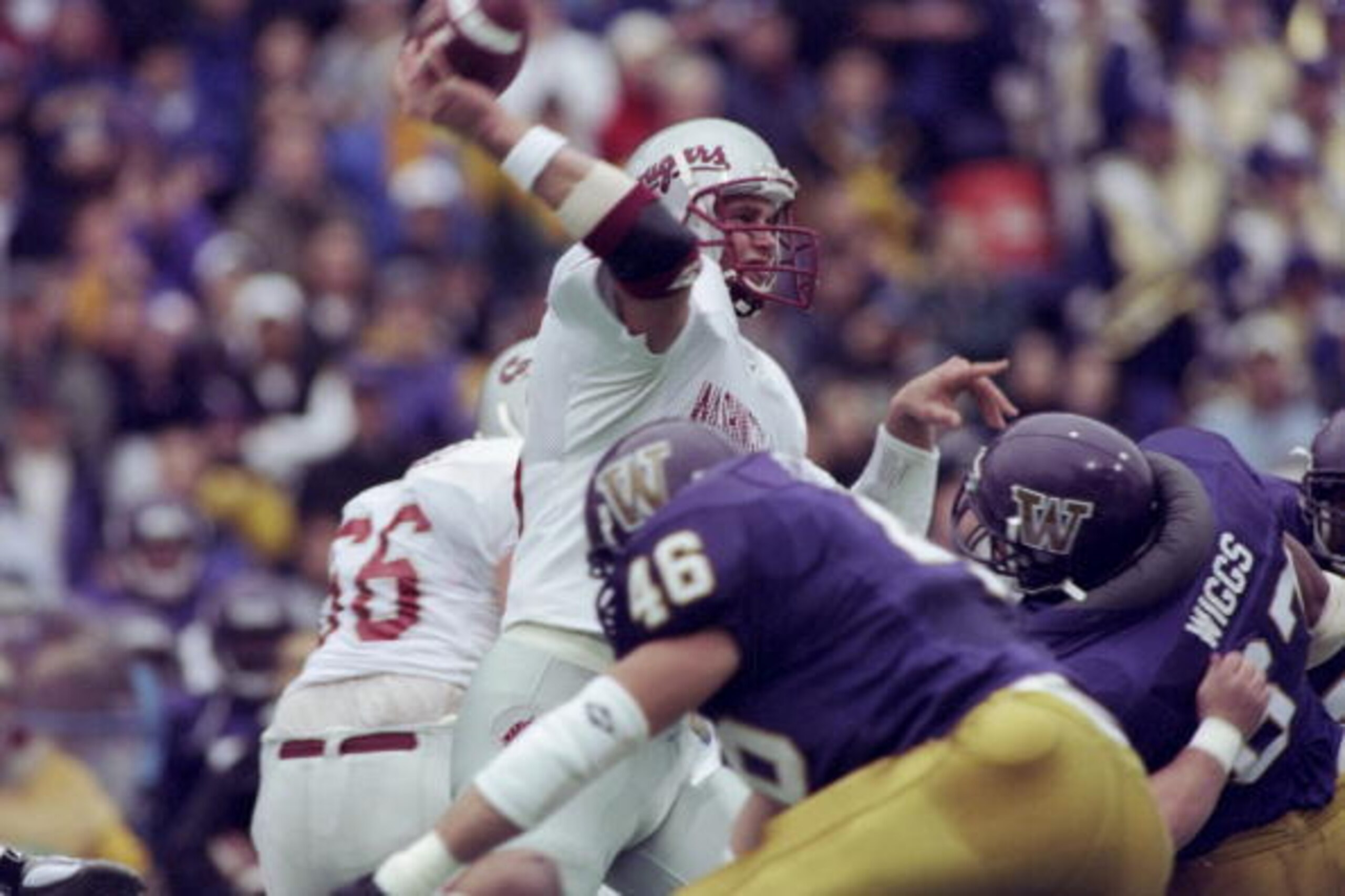 22 Nov 1997:  Quarterback Ryan Leaf of the Washington State Cougars prepares to pass the ball during a game against the Washington Huskies at Husky Stadium in Seattle, Washington.  Washington State won the game 41-35. Mandatory Credit: Aubrey Washington