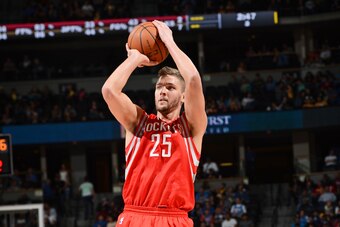 DENVER, CO - APRIL 9: Chandler Parsons #25 of the Houston Rockets shoots against the Denver Nuggets on April 9, 2014 at the Pepsi Center in Denver, Colorado. NOTE TO USER: User expressly acknowledges and agrees that, by downloading and/or using this Photo
