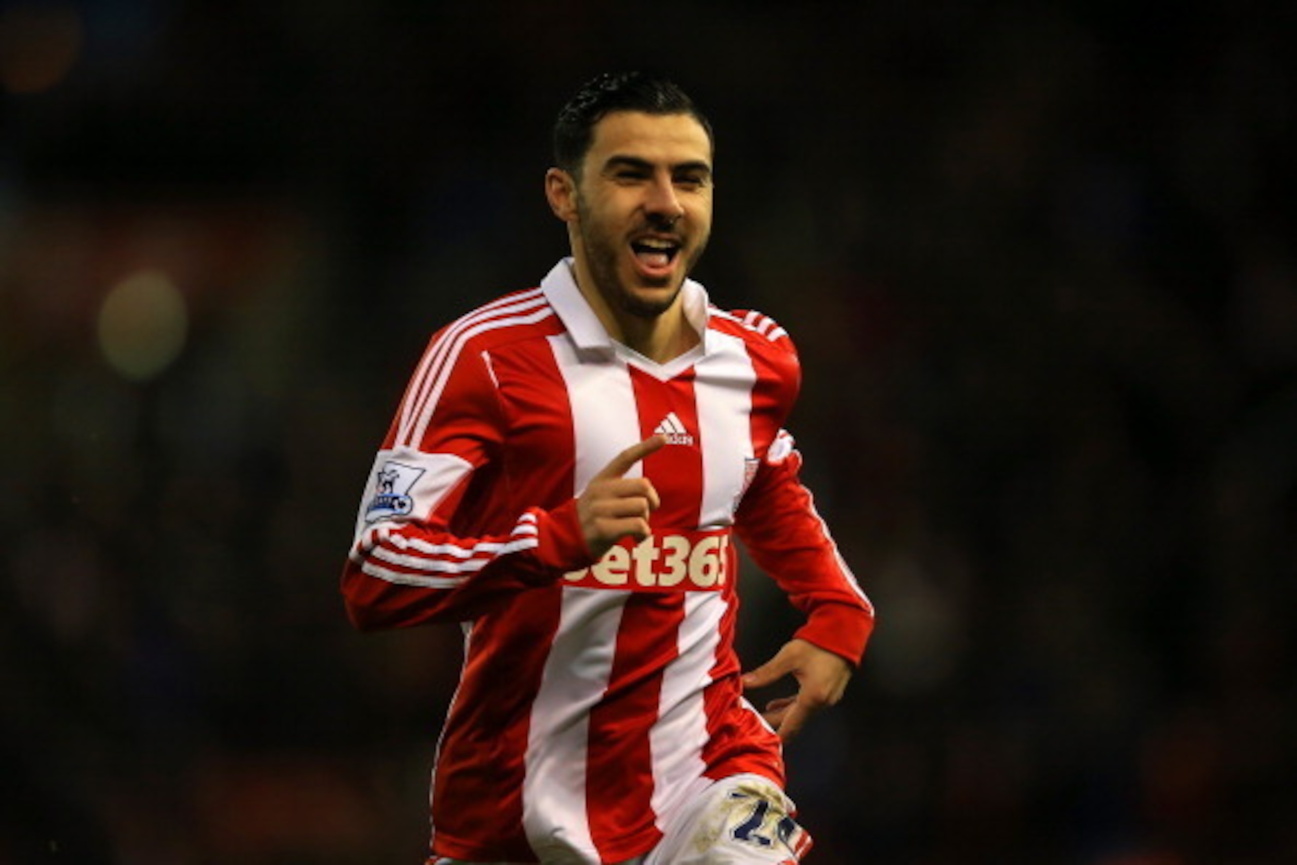 STOKE ON TRENT, ENGLAND - JANUARY 01:  Oussama Assaidi of Stoke City celebrates scoring the opening goal during the Barclays Premier League match between Stoke City and Everton at Britannia Stadium on January 1, 2014 in Stoke on Trent, England.  (Photo by