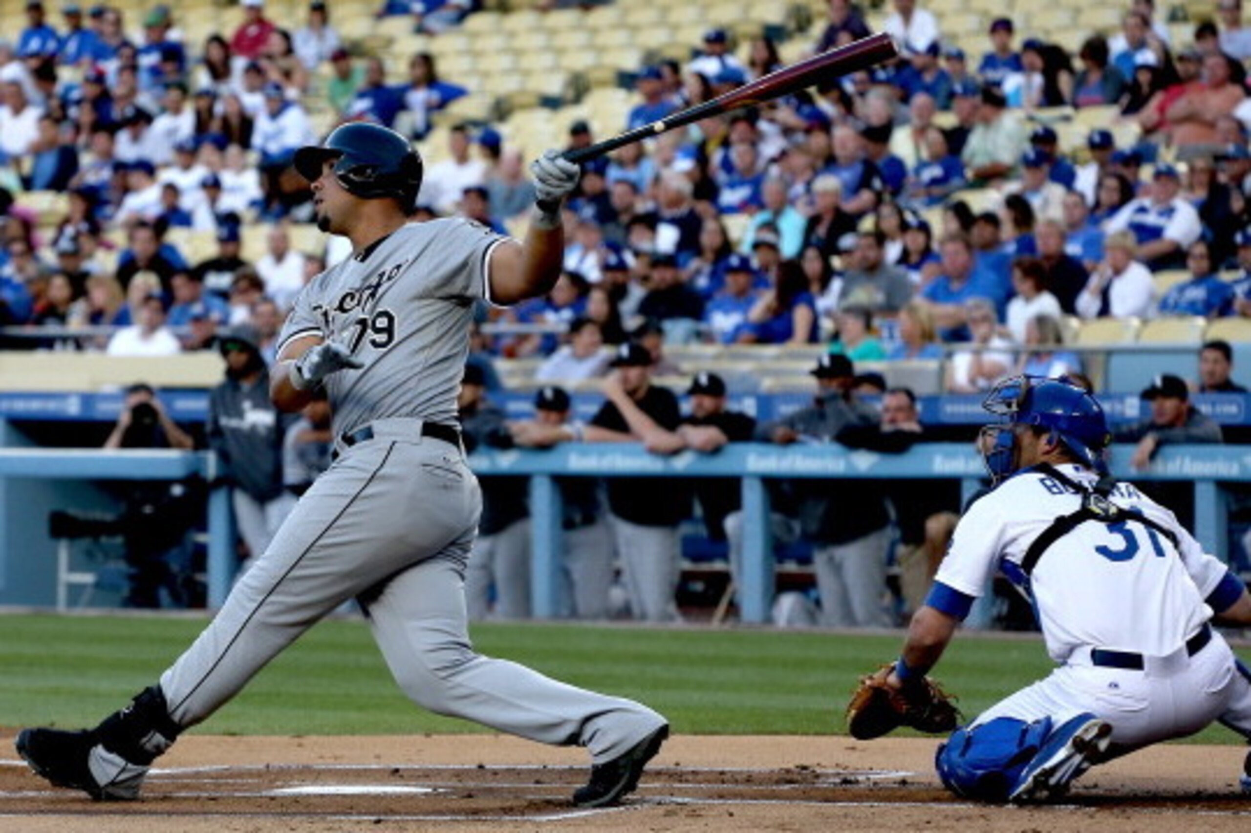 LOS ANGELES, CA - JUNE 03: Jose Abreu #79 of the Chicago White Sox hits a two run home run in the first inning against the Los Angeles Dodgers at Dodger Stadium on June 3, 2014 in Los Angeles, California.  (Photo by Stephen Dunn/Getty Images)