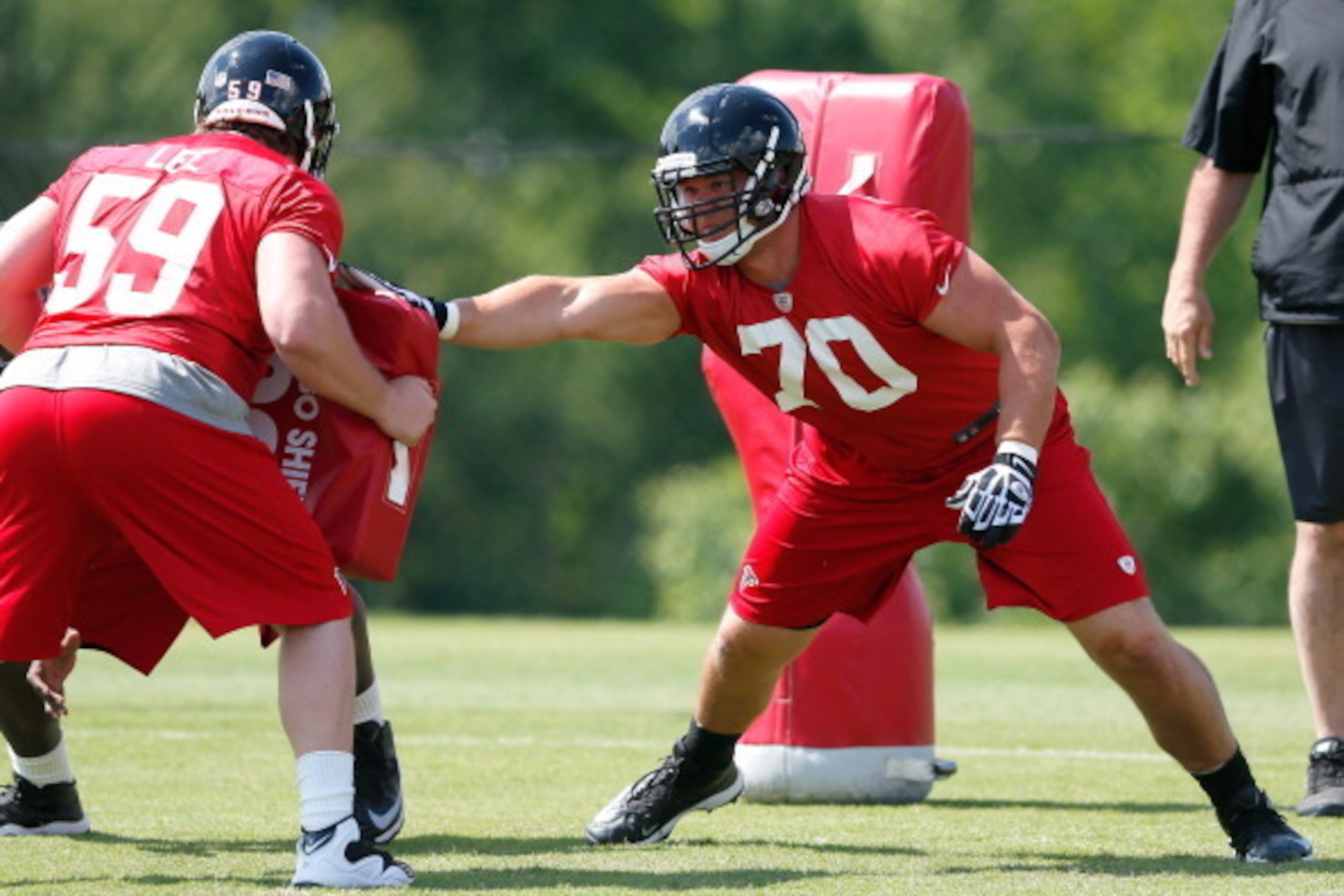 FLOWERY BRANCH, GA - MAY 16: Rookie offensive tackle Jake Matthews #70 of the Atlanta Falcons runs drills during rookie minicamp at the Atlanta Falcons Training Facility on May 16, 2014 in Flowery Branch, Georgia. (Photo by Kevin C. Cox/Getty Images) FLOWERY BRANCH, GA - MAY 16: Rookie offensive tackle Jake Matthews #70 of the Atlanta Falcons runs drills during rookie minicamp at the Atlanta Falcons Training Facility on May 16, 2014 in Flowery Branch, Georgia. (Photo by Kevin C. Cox/Getty Images)