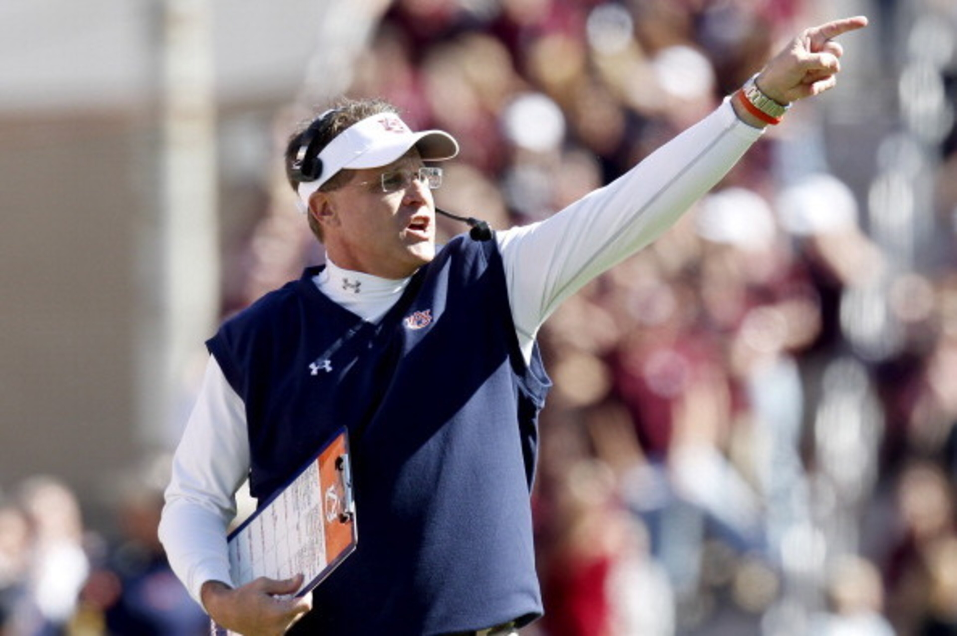 HOUSTON, TX - OCTOBER 19: Head coach Gus Malzahn of the Auburn Tigers coaches against the Texas A&M Aggies on October 19, 2013 at Kyle Field in College Station, Texas. (Photo by Thomas B. Shea/Getty Images) HOUSTON, TX - OCTOBER 19: Head coach Gus Malzahn of the Auburn Tigers coaches against the Texas A&M Aggies on October 19, 2013 at Kyle Field in College Station, Texas. (Photo by Thomas B. Shea/Getty Images)