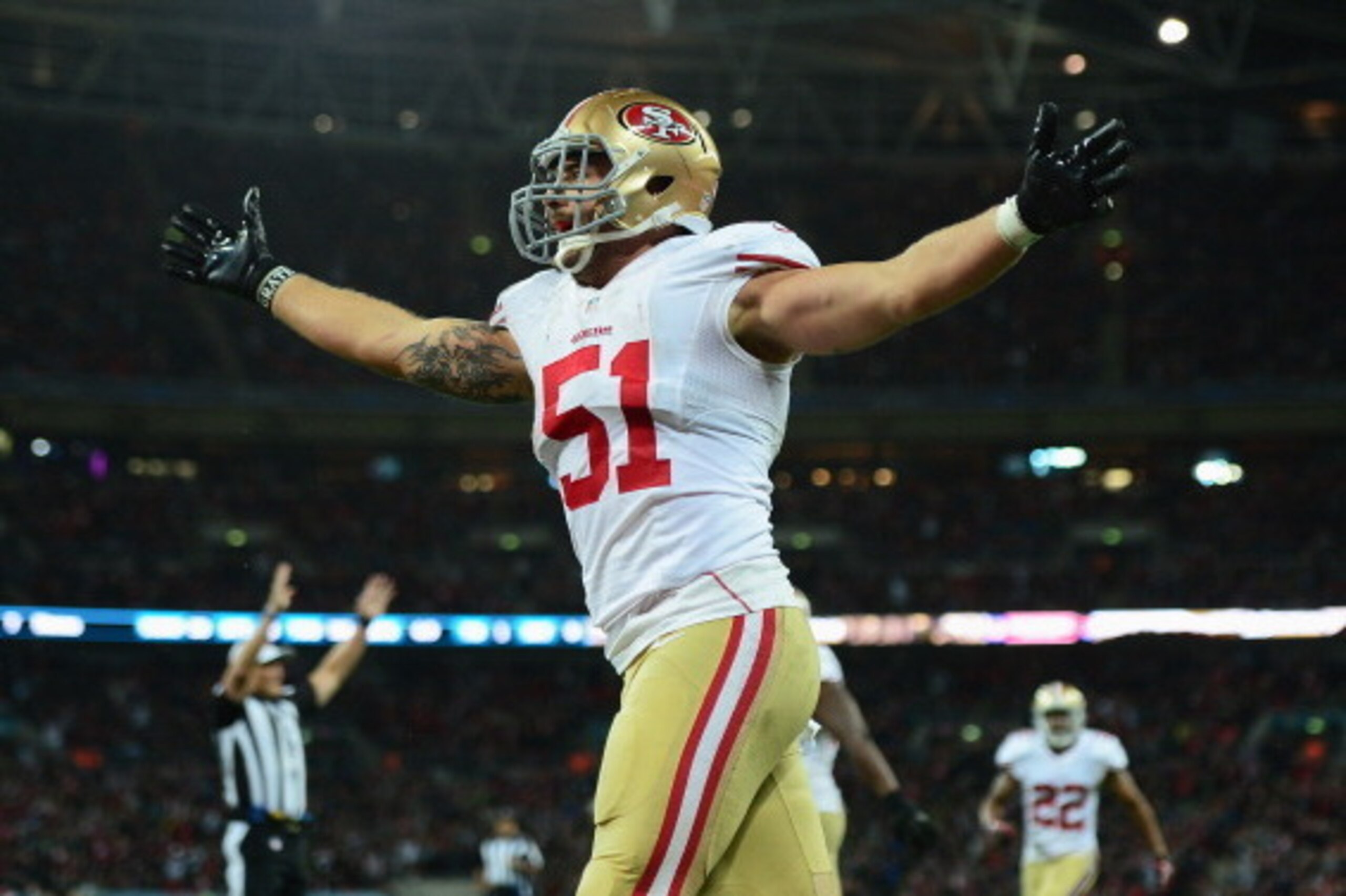 LONDON, ENGLAND - OCTOBER 27:  #51 Dan Skuta of the San Francisco 49ers celebrates after scoring a touchdown during the NFL International Series game between San Francisco 49ers and Jacksonville Jaguars at Wembley Stadium on October 27, 2013 in London, En