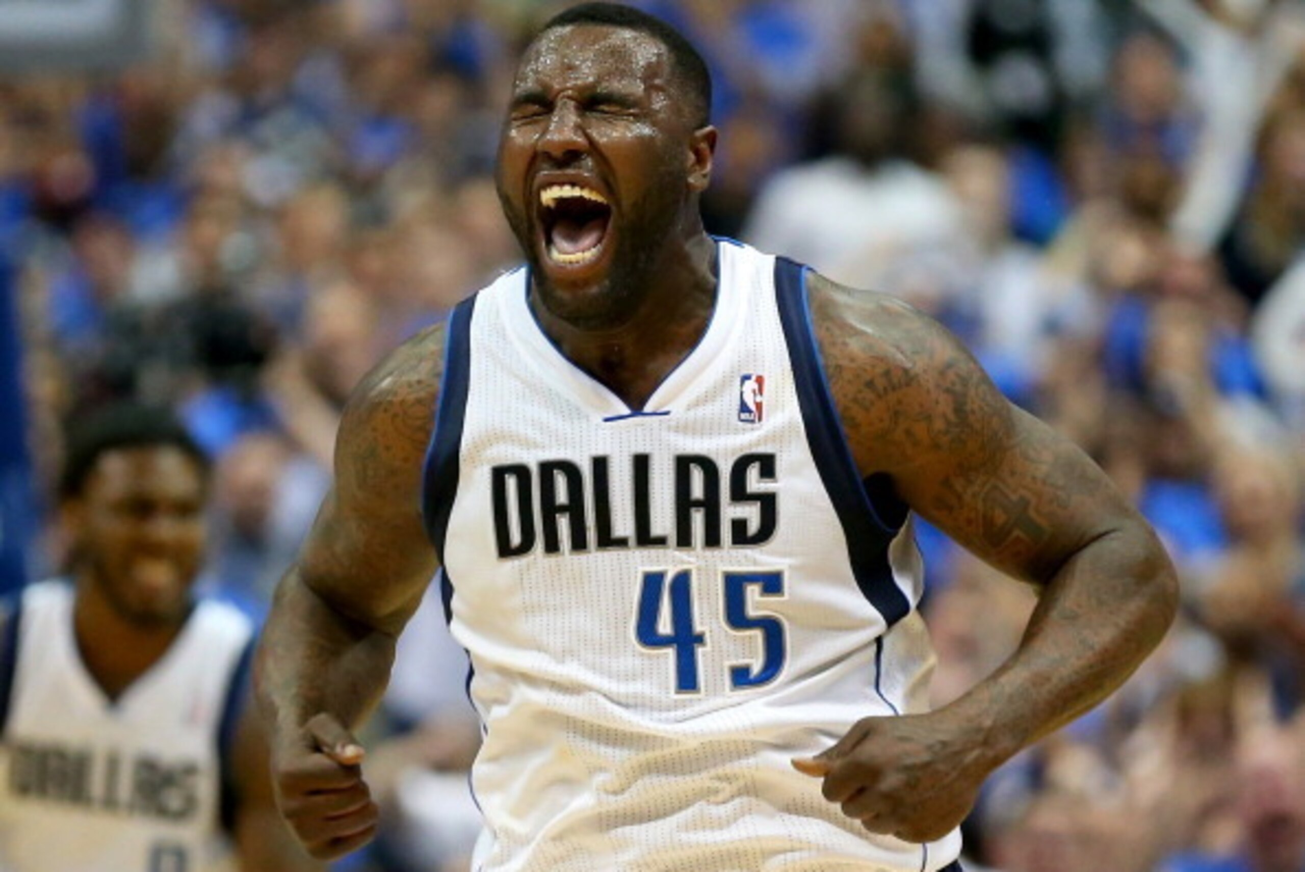 DALLAS, TX - APRIL 28:  DeJuan Blair #45 of the Dallas Mavericks reacts during play against the San Antonio Spurs in Game Four of the Western Conference Quarterfinals during the 2014 NBA Playoffs at American Airlines Center on April 28, 2014 in Dallas, Te