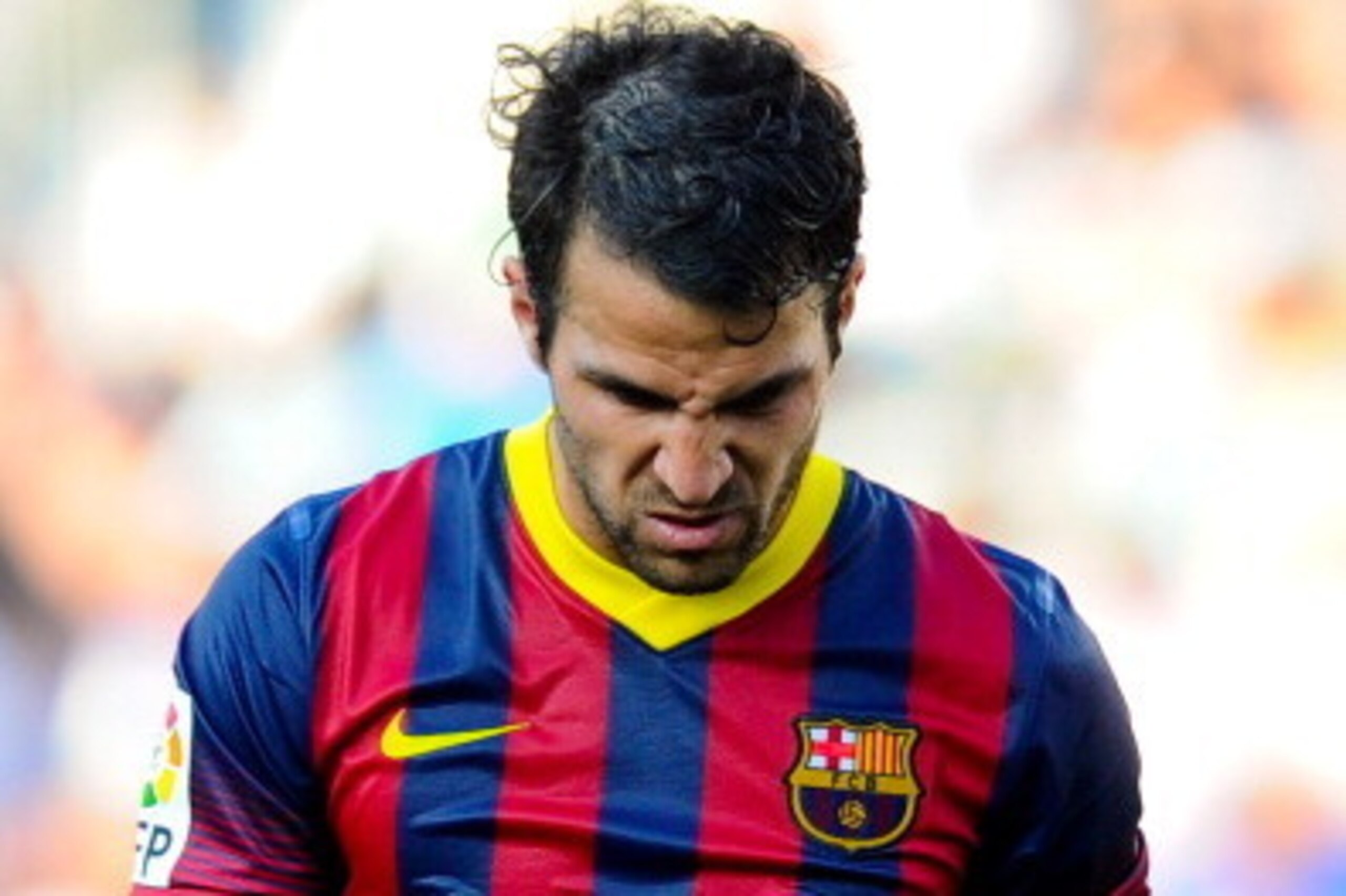 ELCHE, SPAIN - MAY 11:  Cesc Fabregas of FC Barcelona looks down during the La Liga match between Elche FC and FC Barcelona at Estadio Manuel Martinez Valero on May 11, 2014 in Elche, Spain.  (Photo by David Ramos/Getty Images)