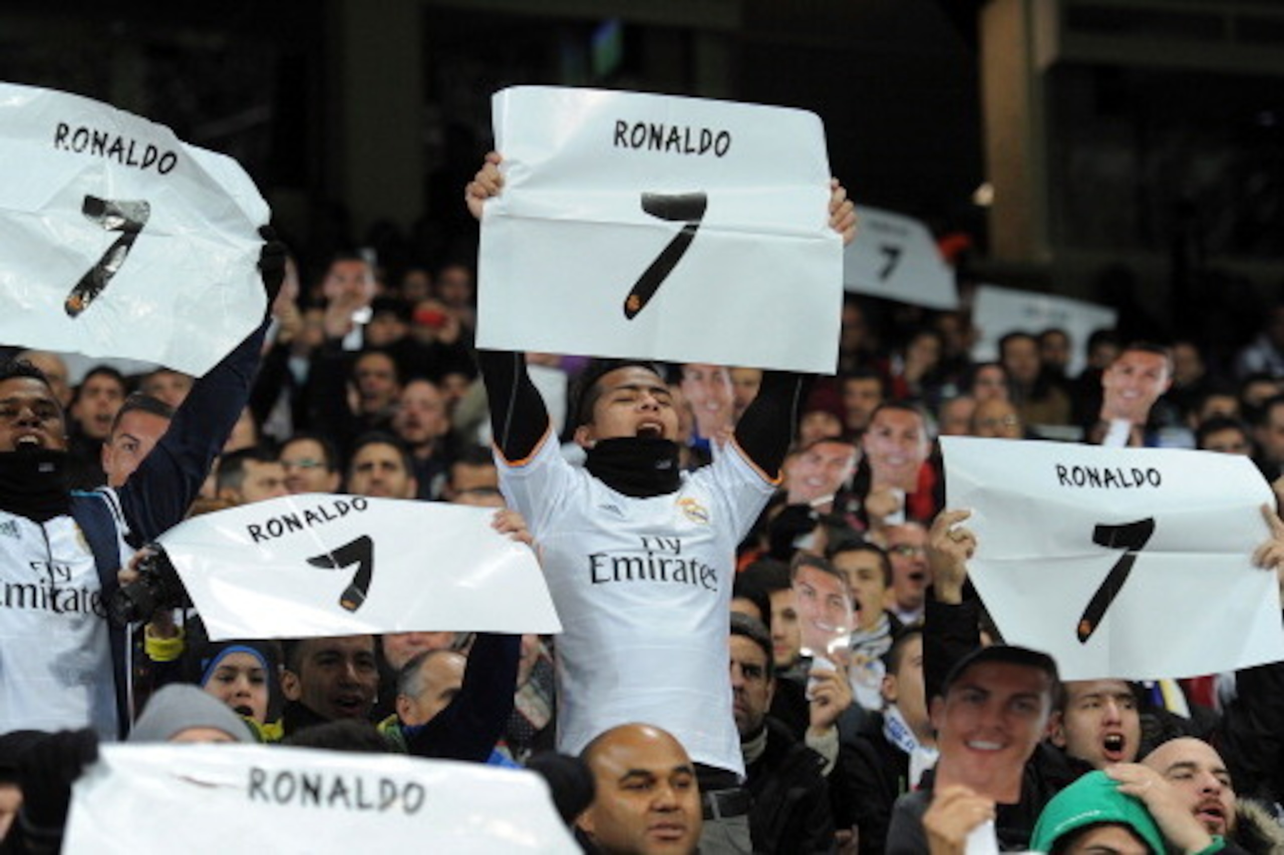 MADRID, SPAIN - NOVEMBER 27:  Fans show their appreciation for injured Real Madrid player Cristiano Ronaldo during the UEFA Champions League group B match between Real Madrid CF and Galatasaray AS at Estadio Santiago Bernabeu on November 27, 2013 in Madri