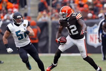 CLEVELAND, OH - DECEMBER 01: Wide receiver Josh Gordon #12 of the Cleveland Browns runs by linebacker Paul Posluszny #51 of the Jacksonville Jaguars at FirstEnergy Stadium on December 1, 2013 in Cleveland, Ohio. (Photo by Matt Sullivan/Getty Images)