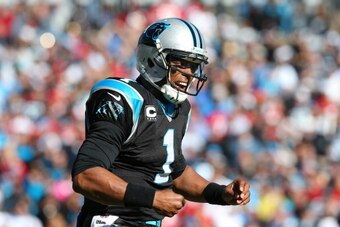 CHARLOTTE, NC - JANUARY 12: Cam Newton #1 of the Carolina Panthers reacts after a play against the San Francisco 49ers during the NFC Divisional Playoff Game at Bank of America Stadium on January 12, 2014 in Charlotte, North Carolina.  (Photo by Ronald Ma
