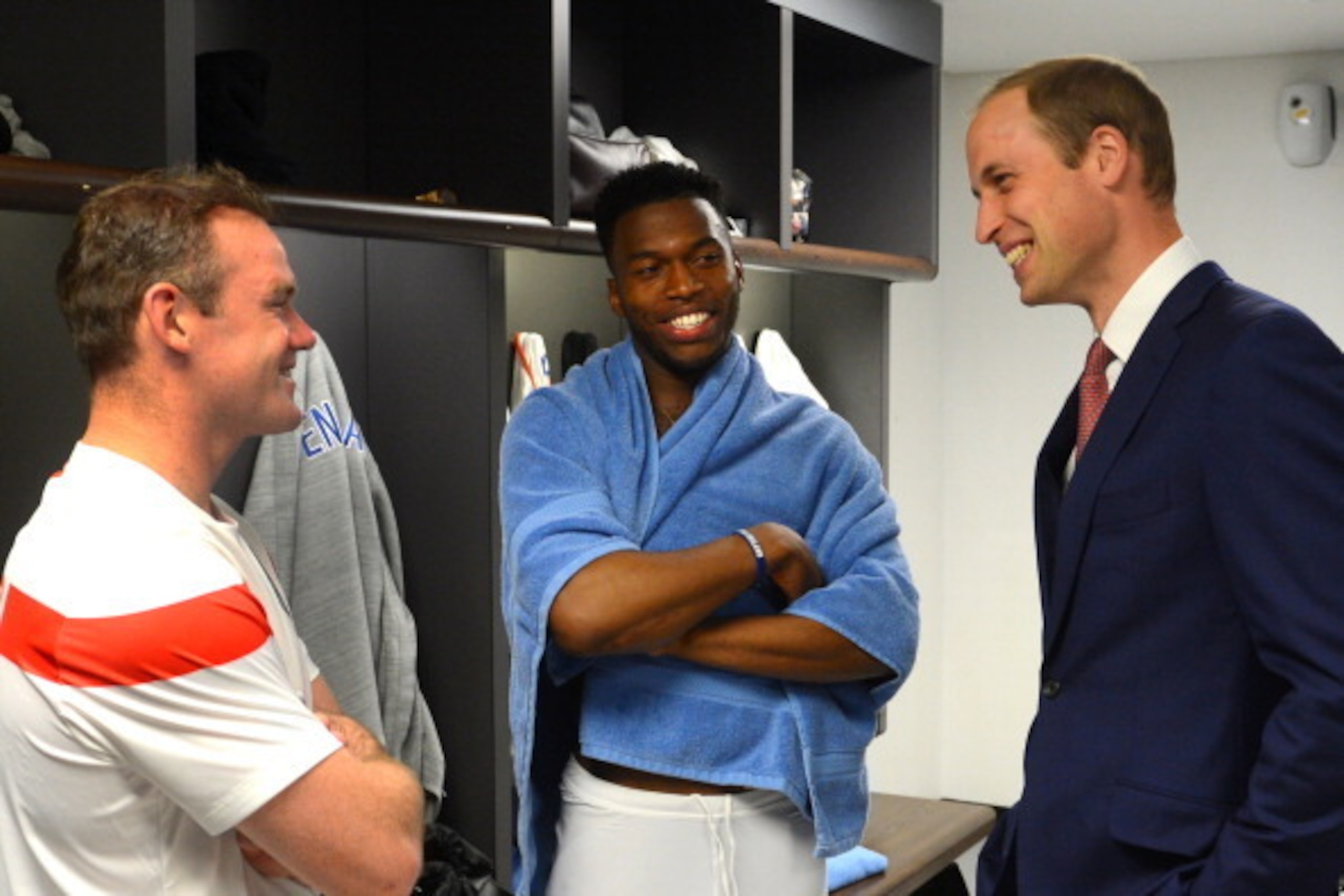 LONDON, ENGLAND - MAY 30: In this handout image provided by The FA, President of the Football Association Prince William, Duke of Cambridge speaks to England players Wayne Rooney and Daniel Sturridge in the team changing room after the International Frien