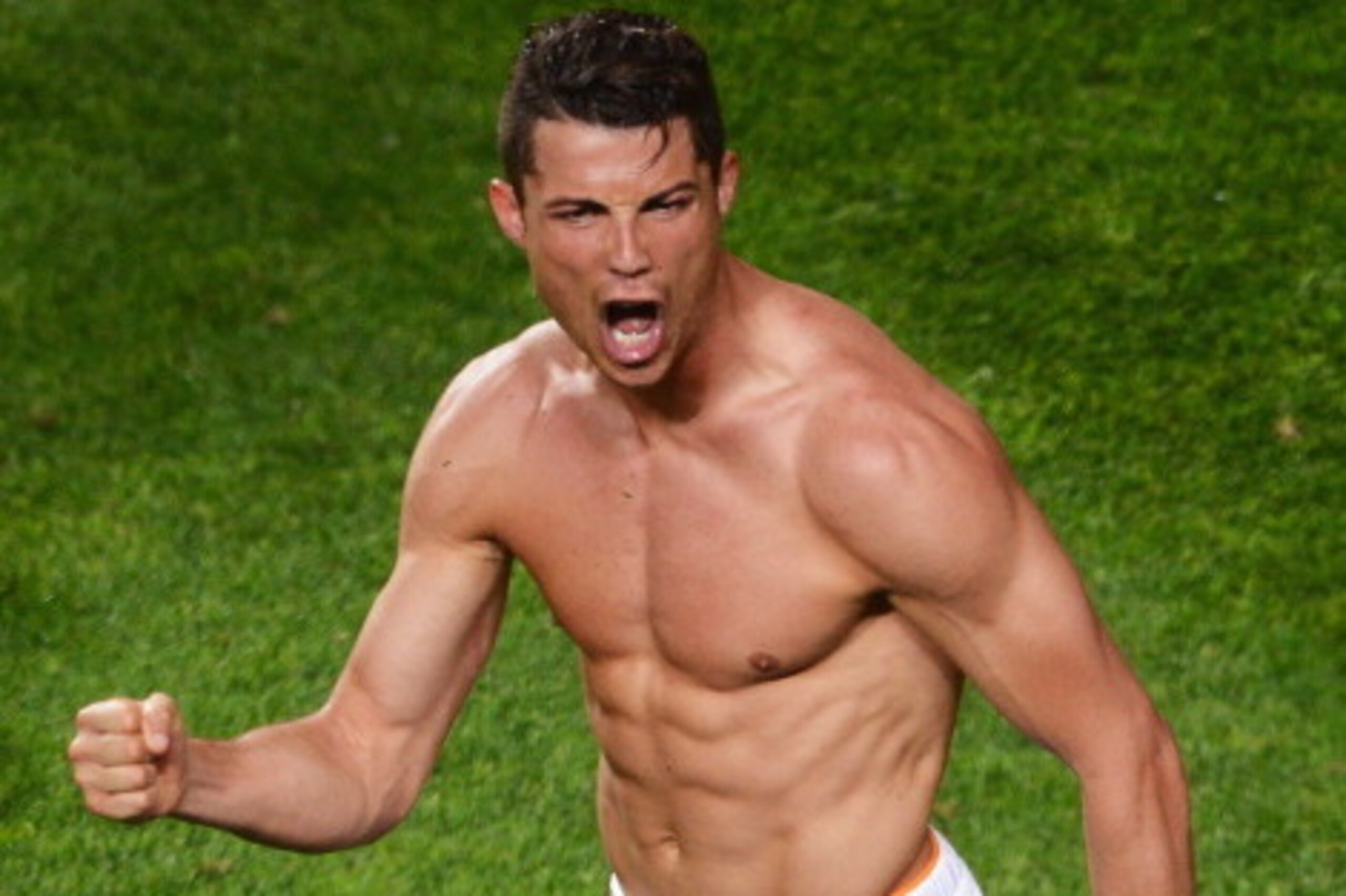 LISBON, PORTUGAL - MAY 24:  Cristiano Ronaldo of Real Madrid  celebrates as he scores their fourth goal during the UEFA Champions League Final between Real Madrid and Atletico de Madrid at Estadio da Luz on May 24, 2014 in Lisbon, Portugal.  (Photo by Lar