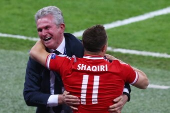 LONDON, ENGLAND - MAY 25:  Head Coach Jupp Heynckes of Bayern Muenchen celebrates victory with Xherdan Shaqiri after the UEFA Champions League final match between Borussia Dortmund and FC Bayern Muenchen at Wembley Stadium on May 25, 2013 in London, Unite