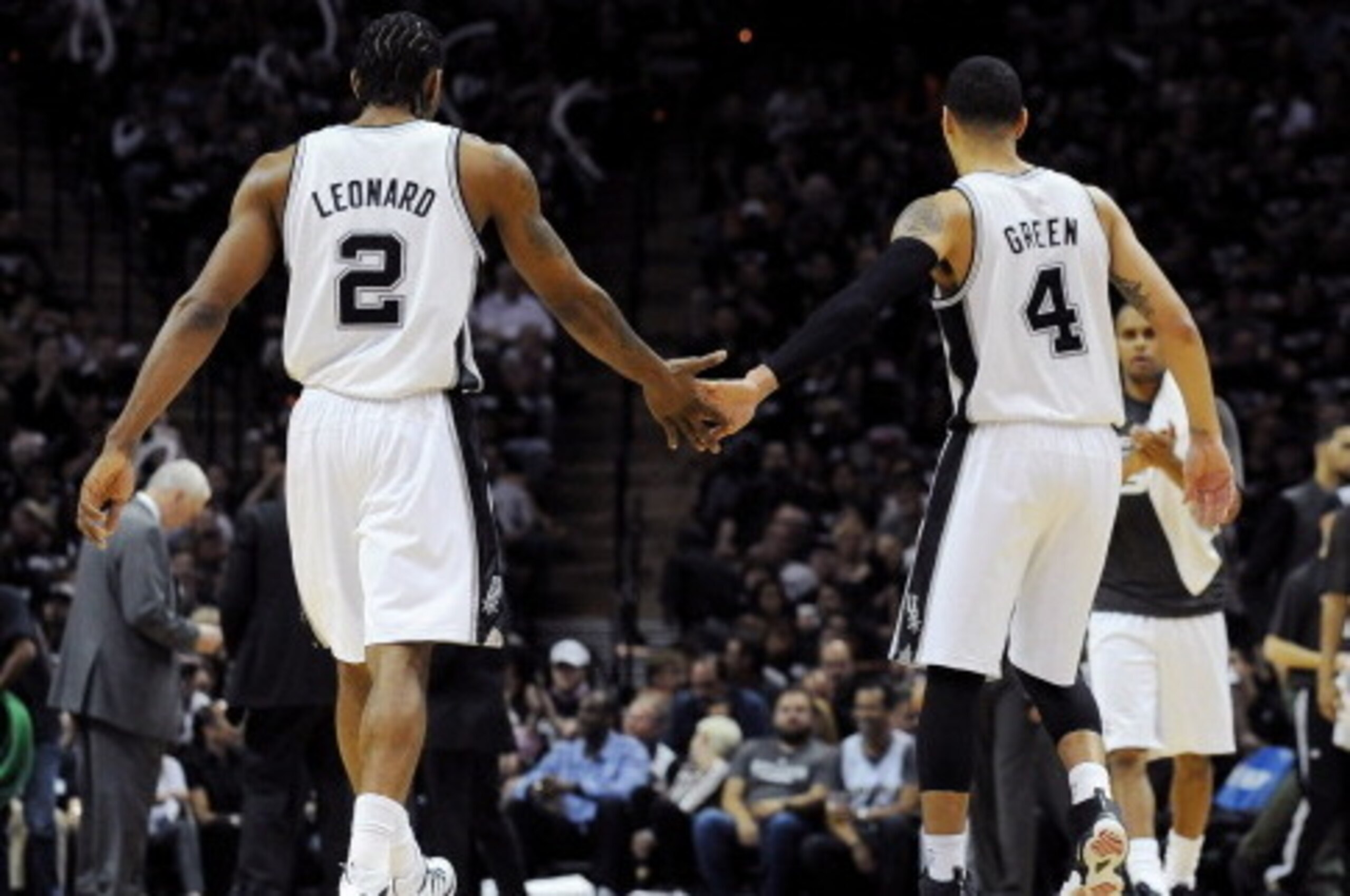 SAN ANTONIO, TX - MAY 19: Kawhi Leonard #2 and Danny Green #4 of the San Antonio Spurs celebrate during a game against the Oklahoma City Thunder in Game One of the Western Conference Finals during the 2014 NBA Playoffs on May 19, 2014 at the AT&T Center i
