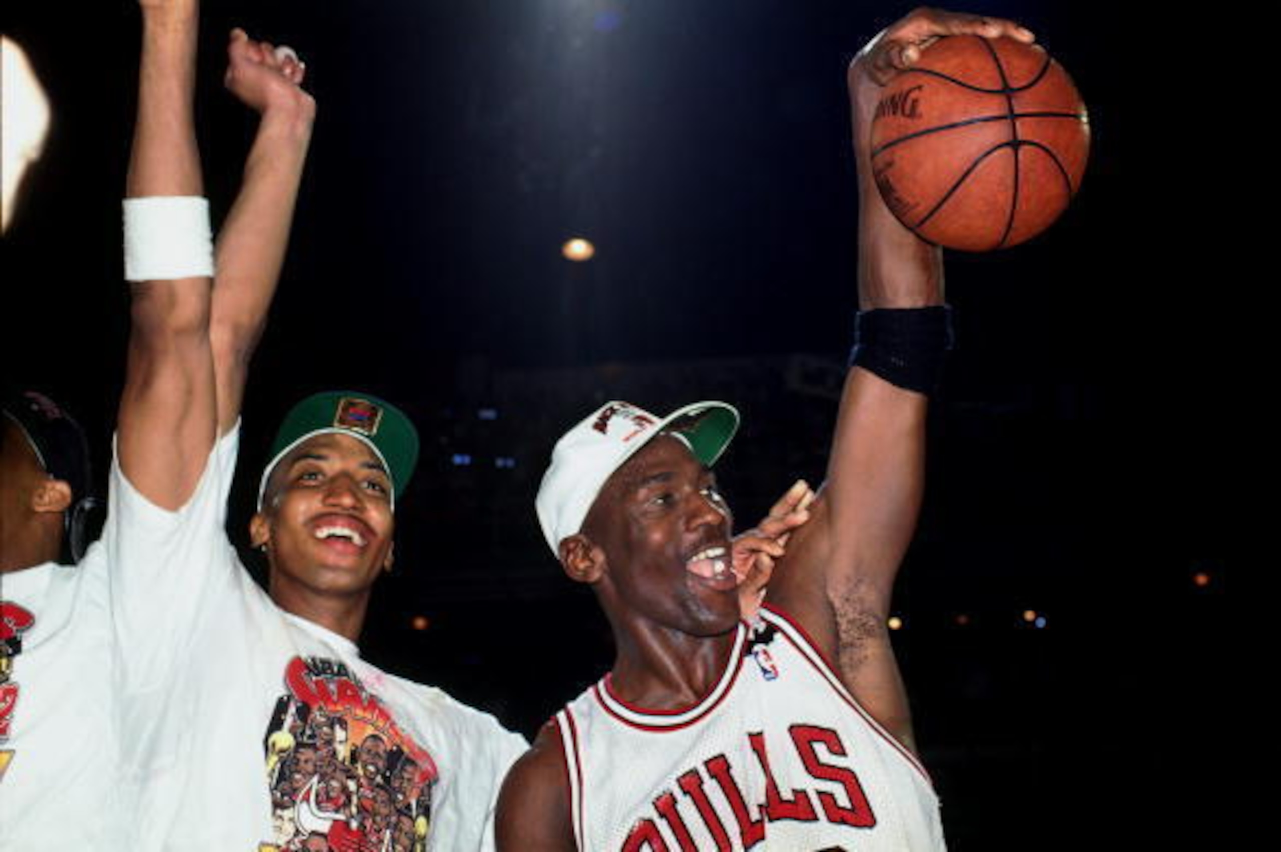 CHICAGO - JUNE 14:  Michael Jordan #23 and teammate Scottie Pippen #33 of the Chicago Bulls celebrate after defeating the Portland Trail Blazers in Game six to win the NBA Championship at Chicago Stadium on June 14, 1992 in Chicago, Illinois.  NOTE TO USE
