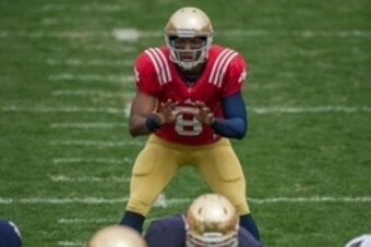 Apr 12, 2014; Notre Dame, IN, USA; Notre Dame Fighting Irish quarterback Malik Zaire (8) prepares for the snap in the first quarter of the Blue-Gold Game at Notre Dame Stadium. Mandatory Credit: Matt Cashore-USA TODAY Sports