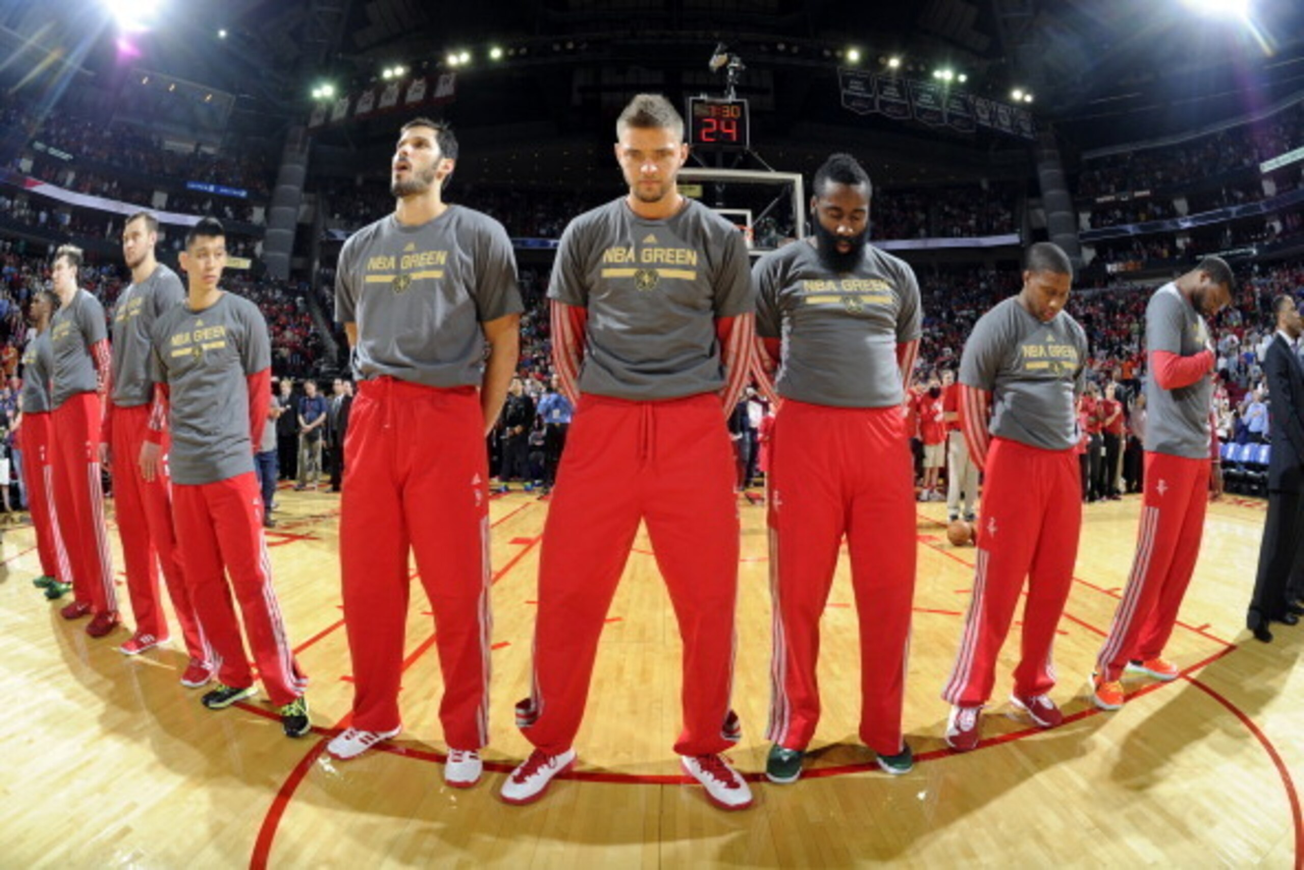HOUSTON, TX - APRIL 4: Omri Casspi #18, Chandler Parsons #25 and James Harden #13 of the Houston Rockets observe the national anthem before the game against the Oklahoma City Thunder on April 4, 2014 at the Toyota Center in Houston, Texas. NOTE TO USER: U HOUSTON, TX - APRIL 4: Omri Casspi #18, Chandler Parsons #25 and James Harden #13 of the Houston Rockets observe the national anthem before the game against the Oklahoma City Thunder on April 4, 2014 at the Toyota Center in Houston, Texas. NOTE TO USER: U