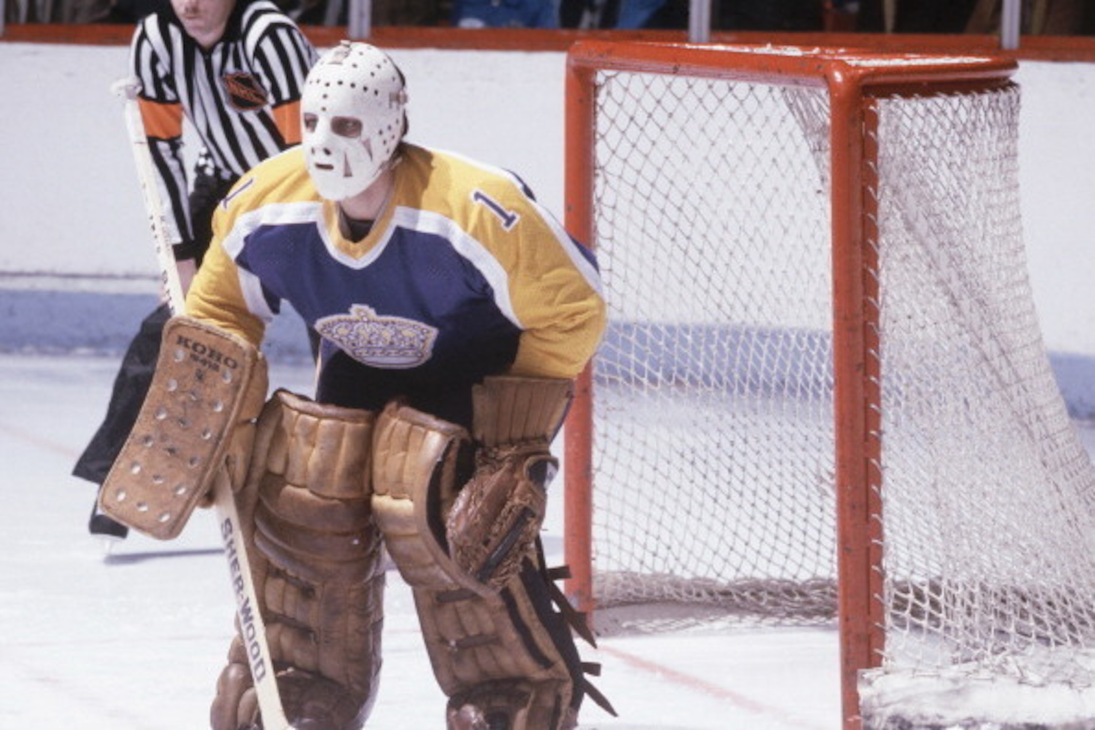 MONTREAL, CANADA - CIRCA 1980:  Mario Lessard #1 of the LA Kings follows the action Circa 1980 at the Montreal Forum in Montreal, Quebec, Canada. (Photo by Denis Brodeur/NHLI via Getty Images)