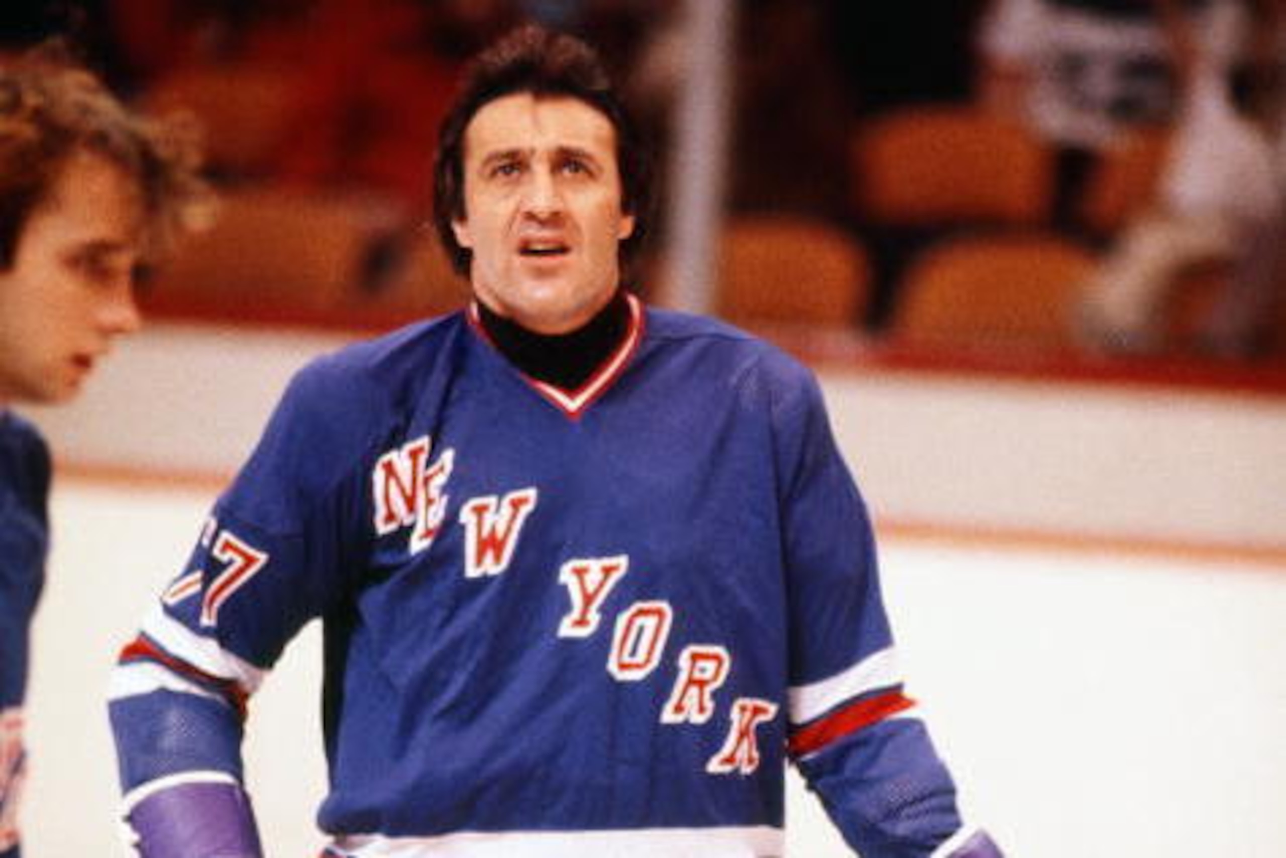 BOSTON, MA - 1970's:  Phil Esposito #77 of the New York Rangers in pre game warm up prior to game against the Boston Bruins at Boston Garden .  (Photo by Steve Babineau/NHLI via Getty Images)