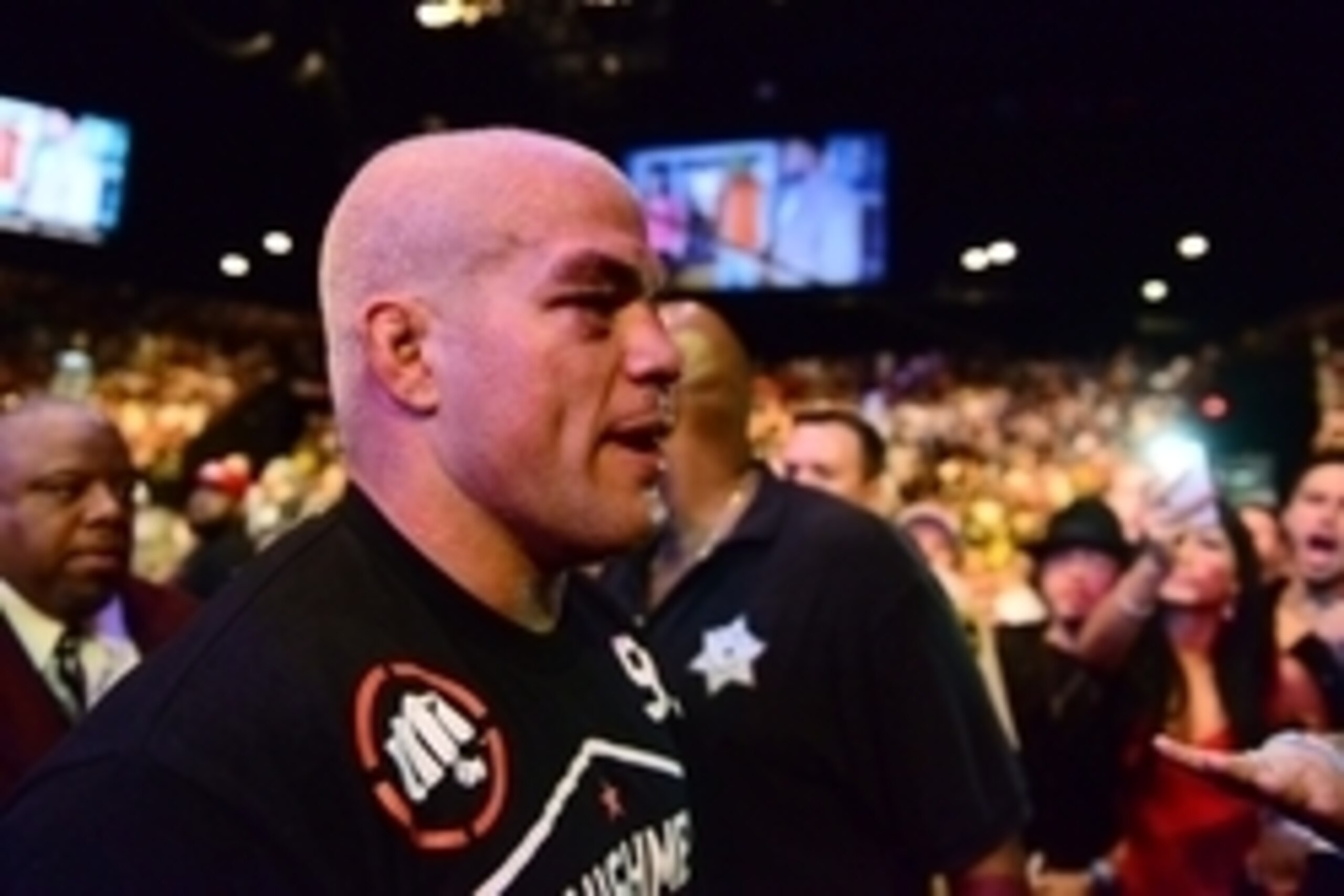 Jul. 7, 2012; Las Vegas, NV, USA; UFC fighter Tito Ortiz reacts as he leaves the octagon following his loss to Forrest Griffin (not pictured) during a light heavyweight bout in UFC 148 at the MGM Grand Garden Arena. Ortiz announced his retirement followin