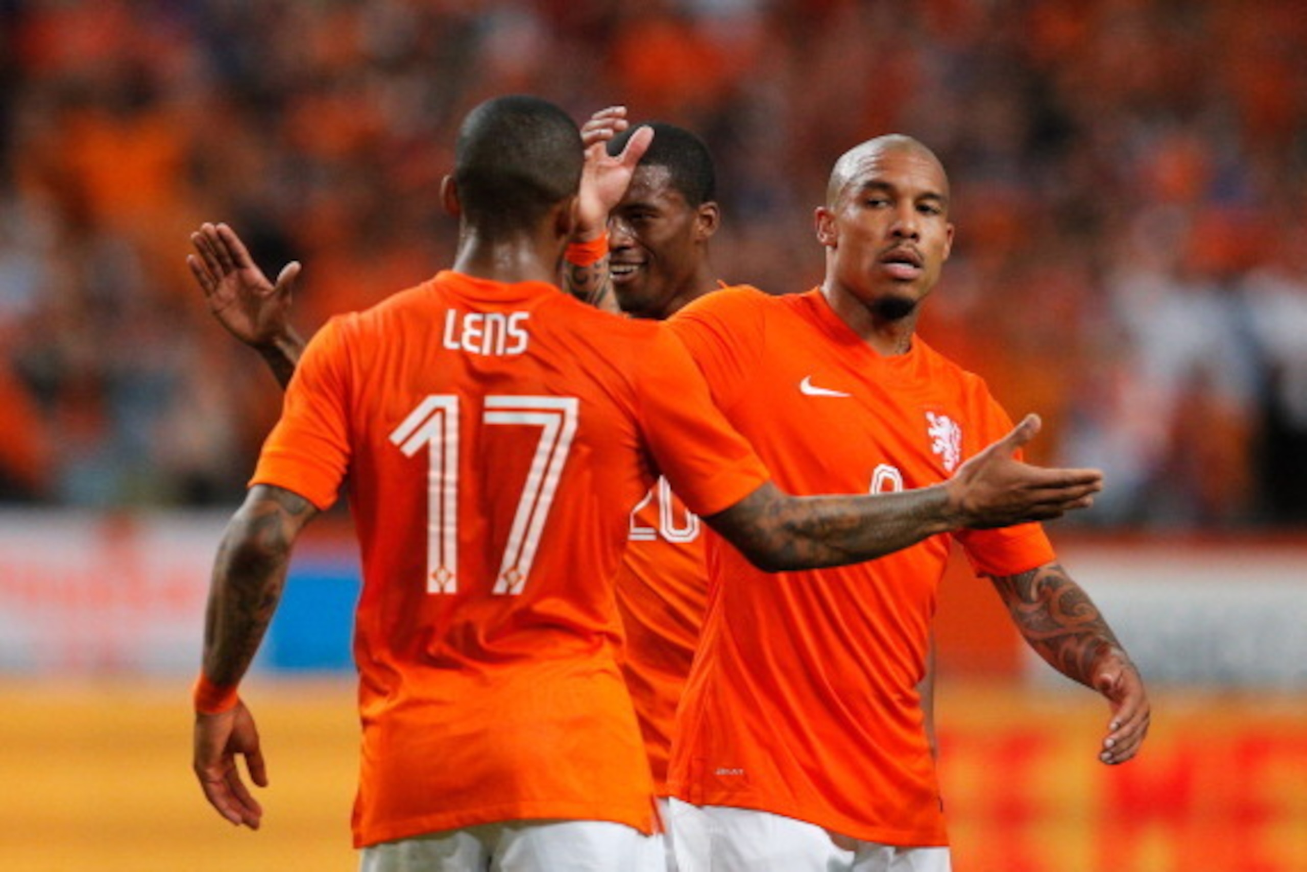 AMSTERDAM, NETHERLANDS - JUNE 04:  Jeremain Lens (#17) of Netherlands celebrates scoring the second goal of the game with Nigel De Jong and Georgino Wijnaldum during the International Friendly match between The Netherlands and Wales at Amsterdam Arena on 
