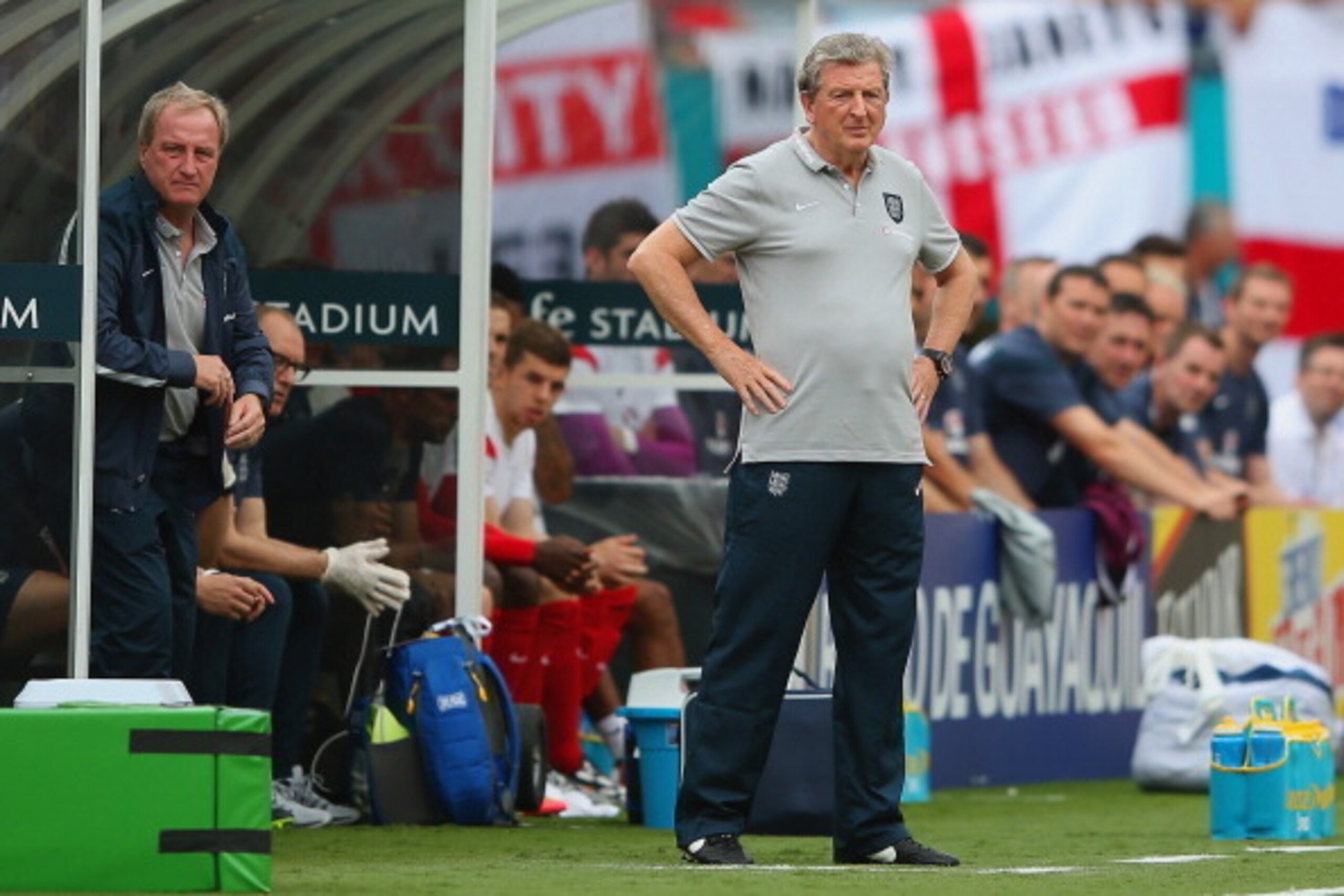 MIAMI GARDENS, FL - JUNE 04:  England manager Roy Hodgson (R) and England assistant manager Ray Lewington look on from the dugout during the International friendly match between England and Ecuador at Sun Life Stadium on June 4, 2014 in Miami Gardens, Flo