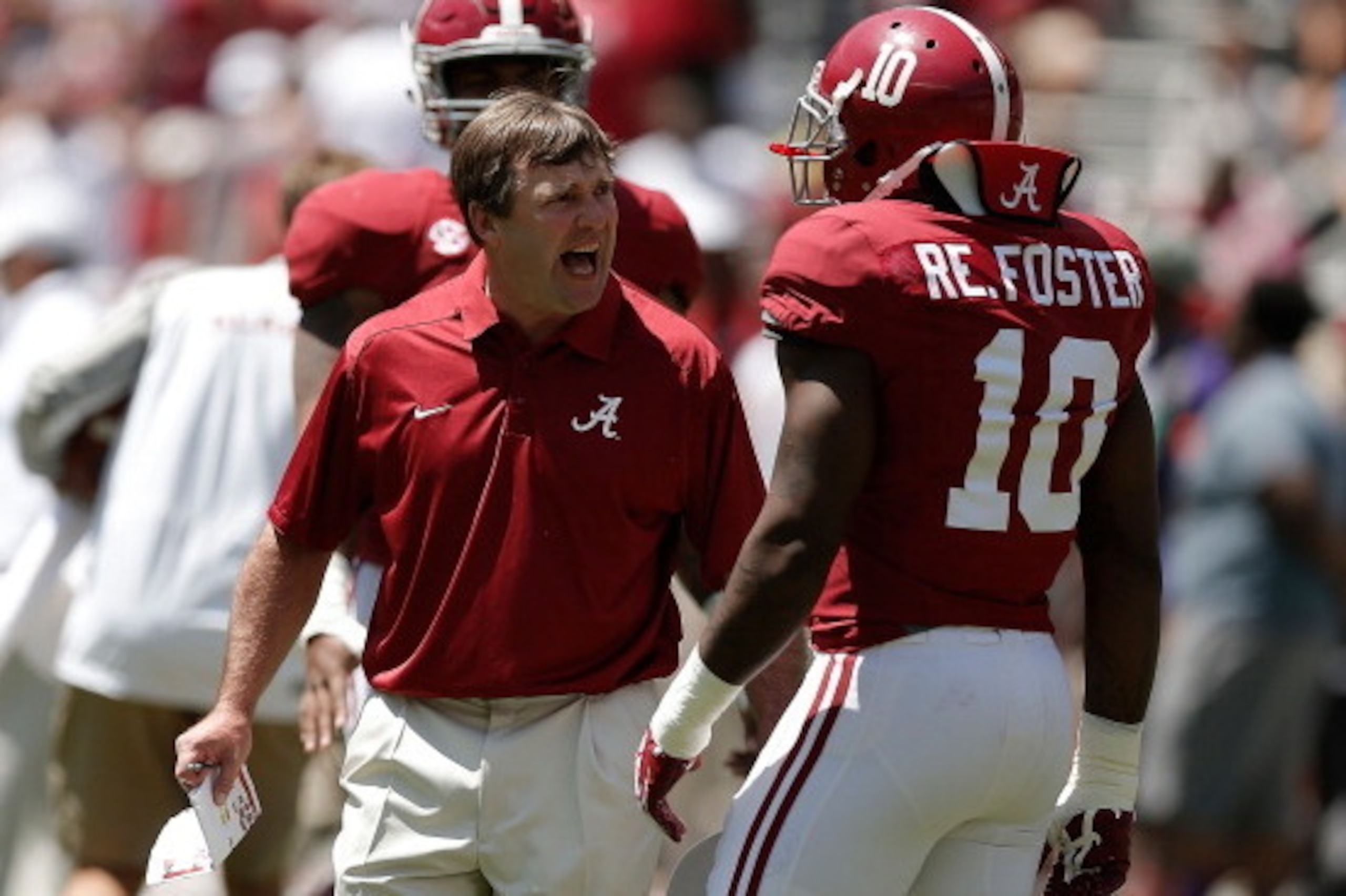 TUSCALOOSA, AL - APRIL 19:  Defensive coordinator Kirby Smart yells at Reuben Foster #10 of the Crimson team prior to the University of Alabama A-Day spring game at Bryant-Denny Stadium on April 19, 2014 in Tuscaloosa, Alabama.  (Photo by Stacy Revere/Get