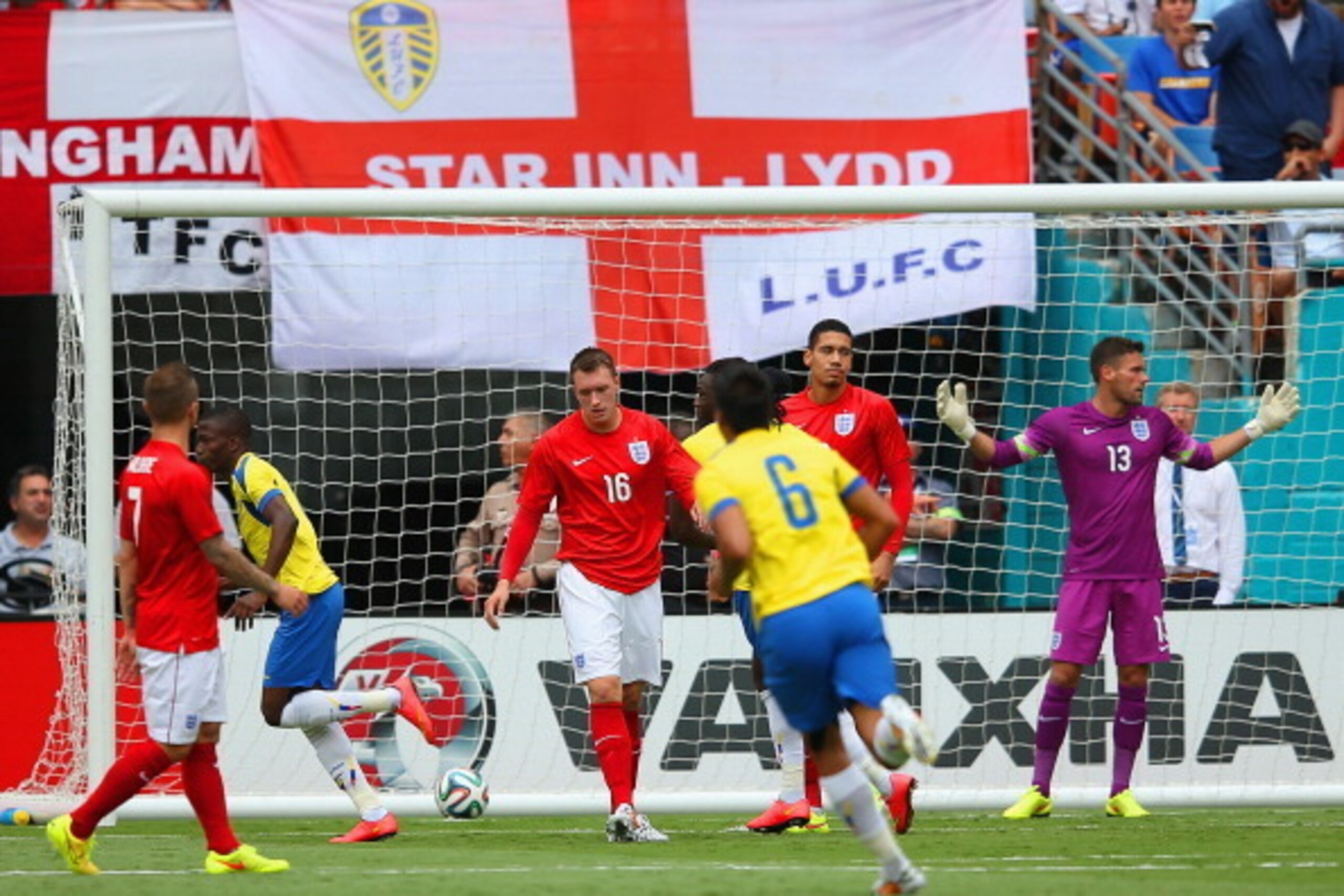 MIAMI GARDENS, FL - JUNE 04:  Enner Valencia of Ecuador turns  to celebrate after scoring the first goal as Ben Foster of England reacts during the International friendly match between England and Ecuador at Sun Life Stadium on June 4, 2014 in Miami Garde
