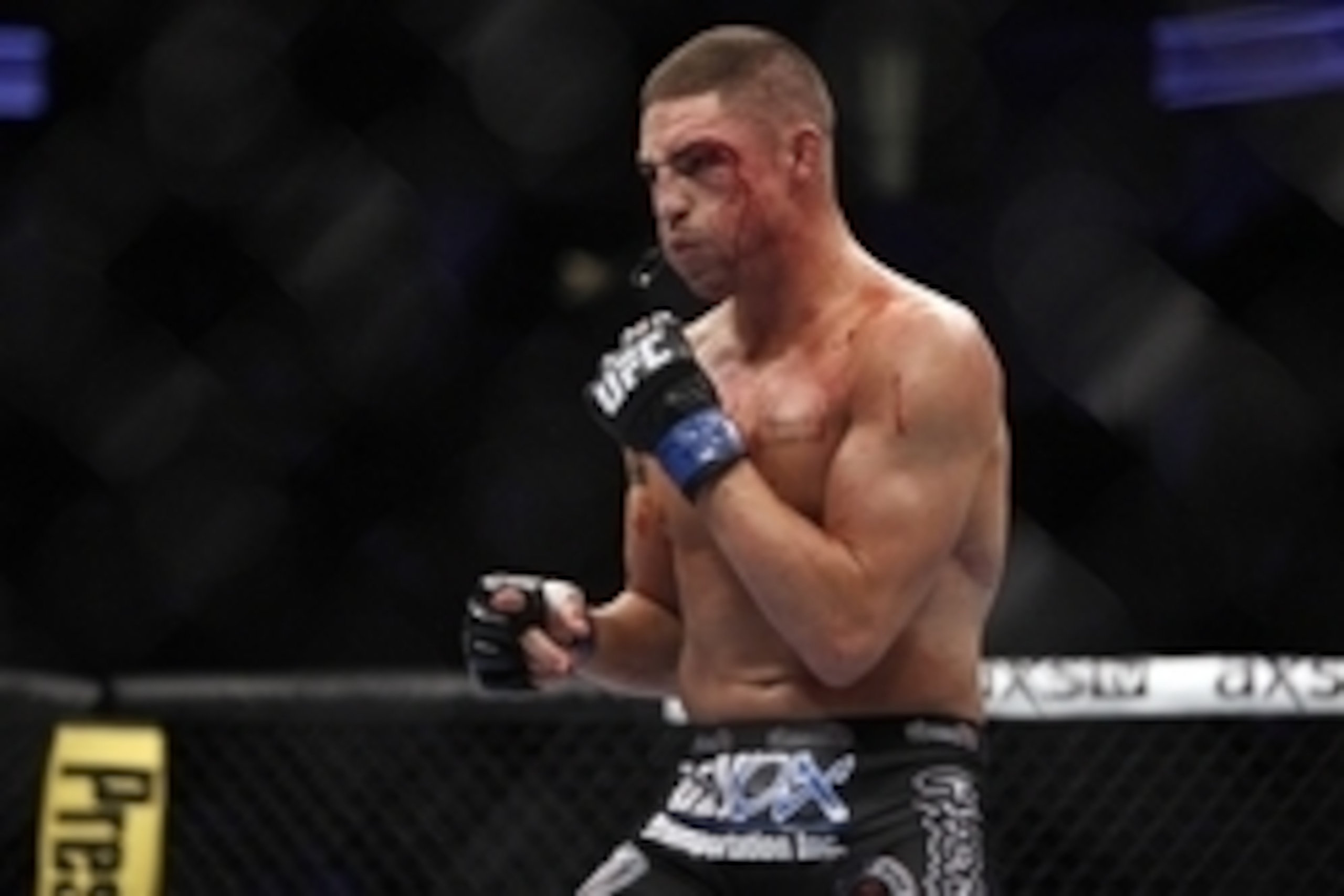 Oct 19, 2013; Houston, TX, USA; Diego Sanchez fights against Gilbert Melendez (not pictured) in their lightweight bout during UFC 166 at Toyota Center. Mandatory Credit: Andrew Richardson-USA TODAY Sports