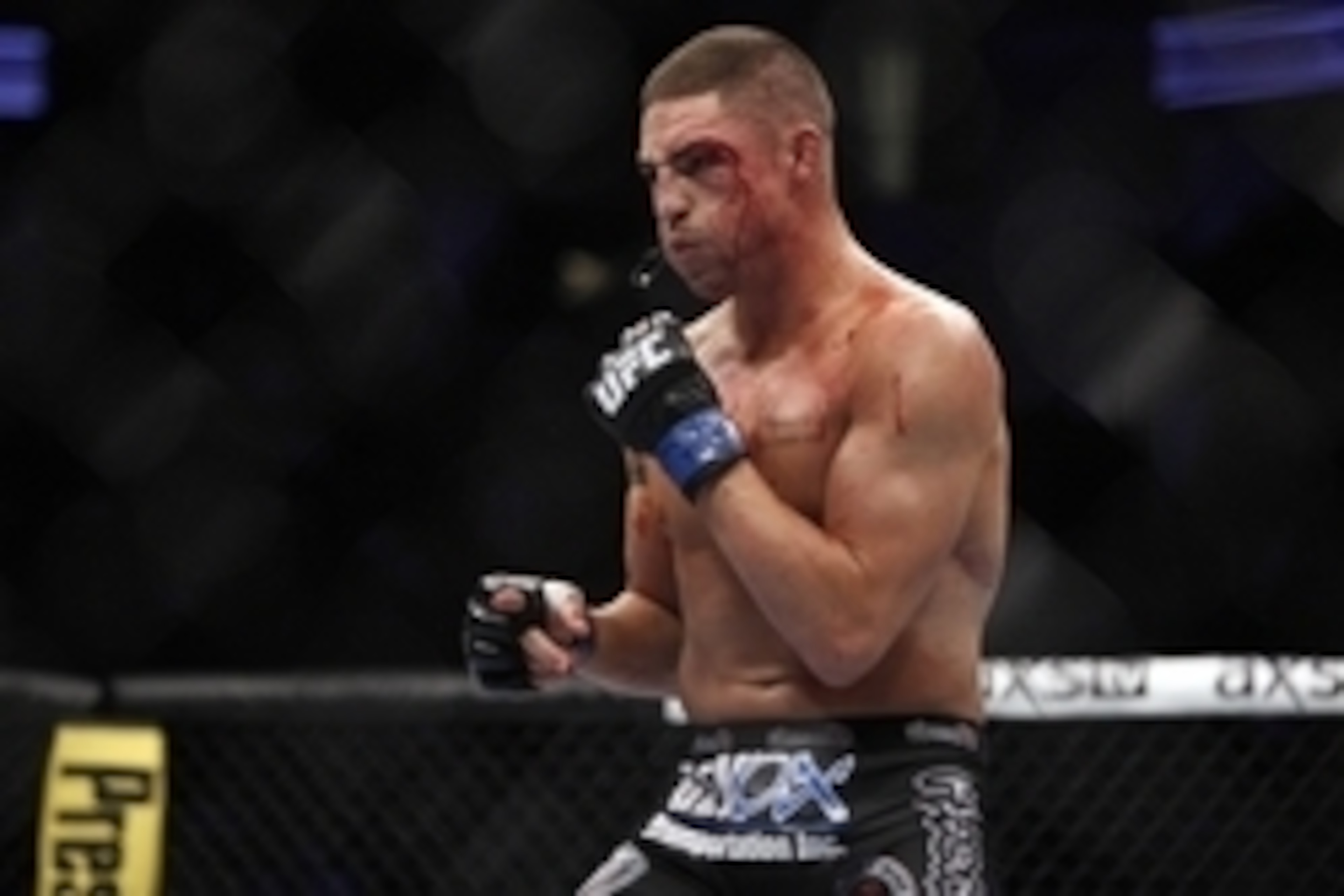 Oct 19, 2013; Houston, TX, USA; Diego Sanchez fights against Gilbert Melendez (not pictured) in their lightweight bout during UFC 166 at Toyota Center. Mandatory Credit: Andrew Richardson-USA TODAY Sports