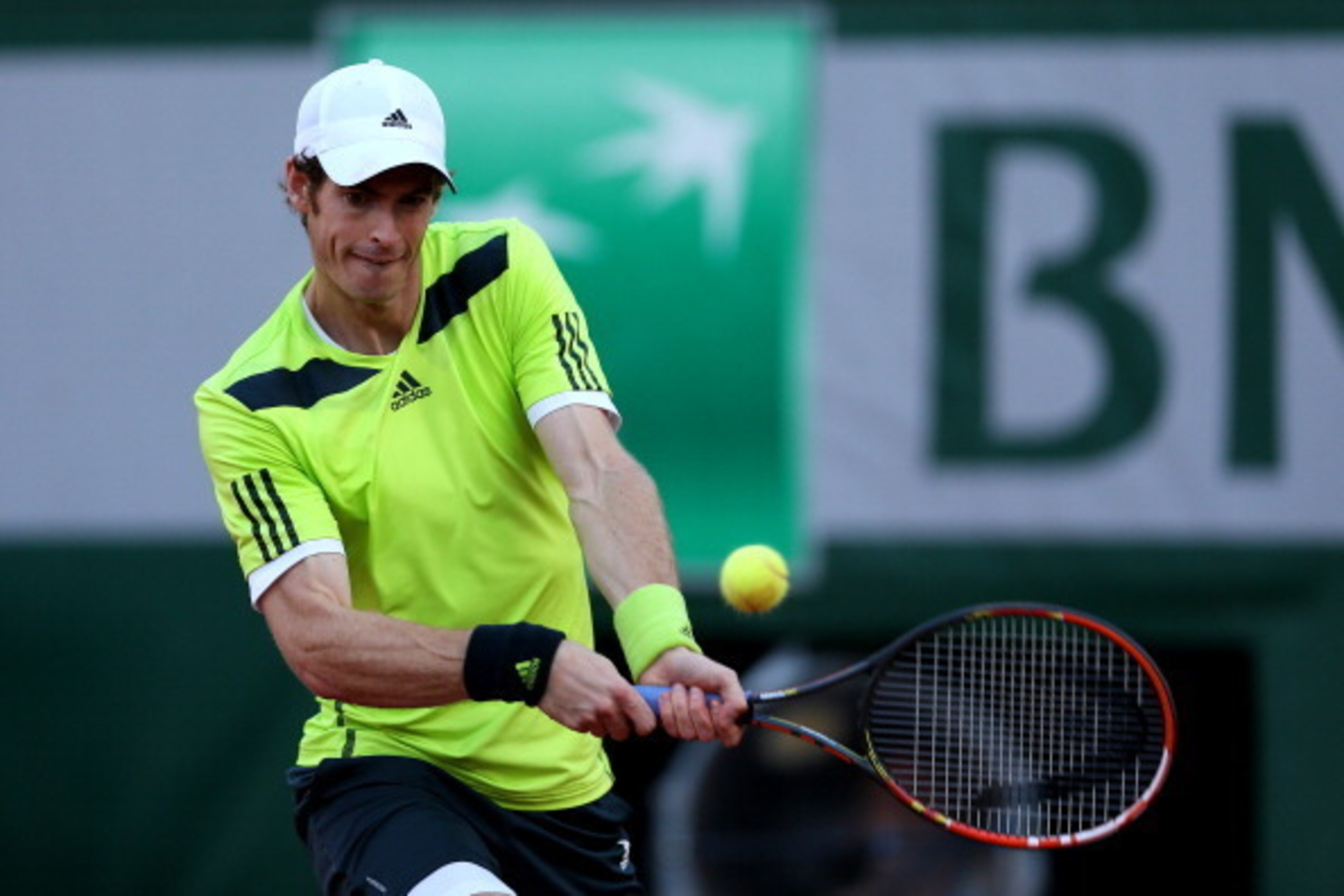 PARIS, FRANCE - JUNE 04:  Andy Murray of Great Britain returns a shot during his men's singles quarter-final match against Gael Monfils of France on day eleven of the French Open at Roland Garros on June 4, 2014 in Paris, France.  (Photo by Matthew Stockm