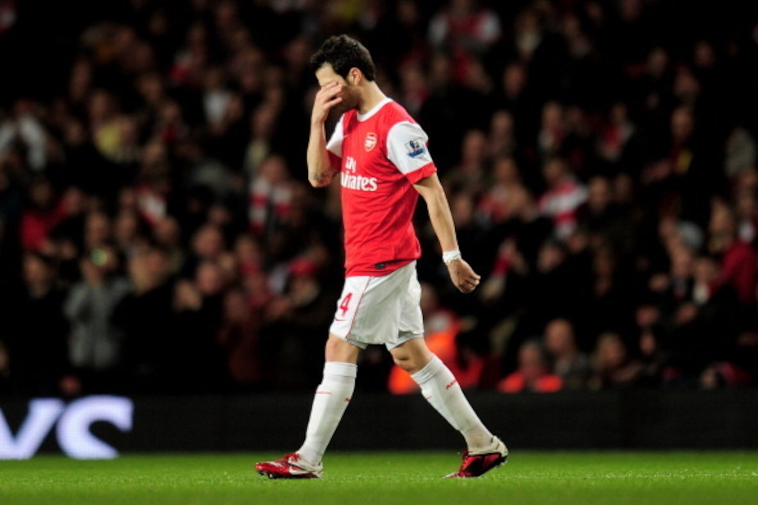 LONDON, ENGLAND - FEBRUARY 23:  Cesc Fabregas of Arsenal  looks dejected as he leaves the pitch injured during the Barclays Premier League match between Arsenal and Stoke City at the Emirates Stadium on February 23, 2011 in London, England.  (Photo by Sha
