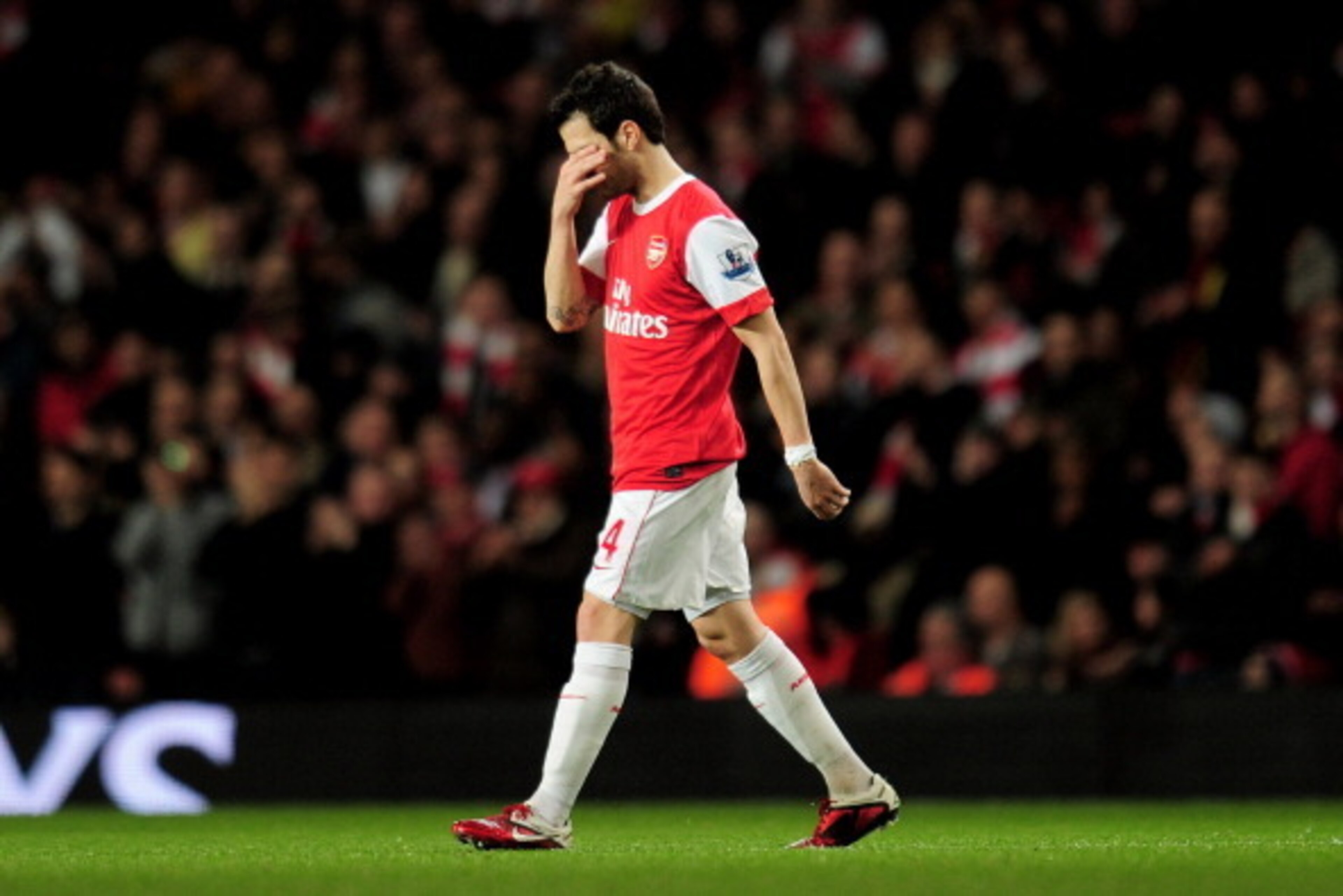 LONDON, ENGLAND - FEBRUARY 23:  Cesc Fabregas of Arsenal  looks dejected as he leaves the pitch injured during the Barclays Premier League match between Arsenal and Stoke City at the Emirates Stadium on February 23, 2011 in London, England.  (Photo by Sha