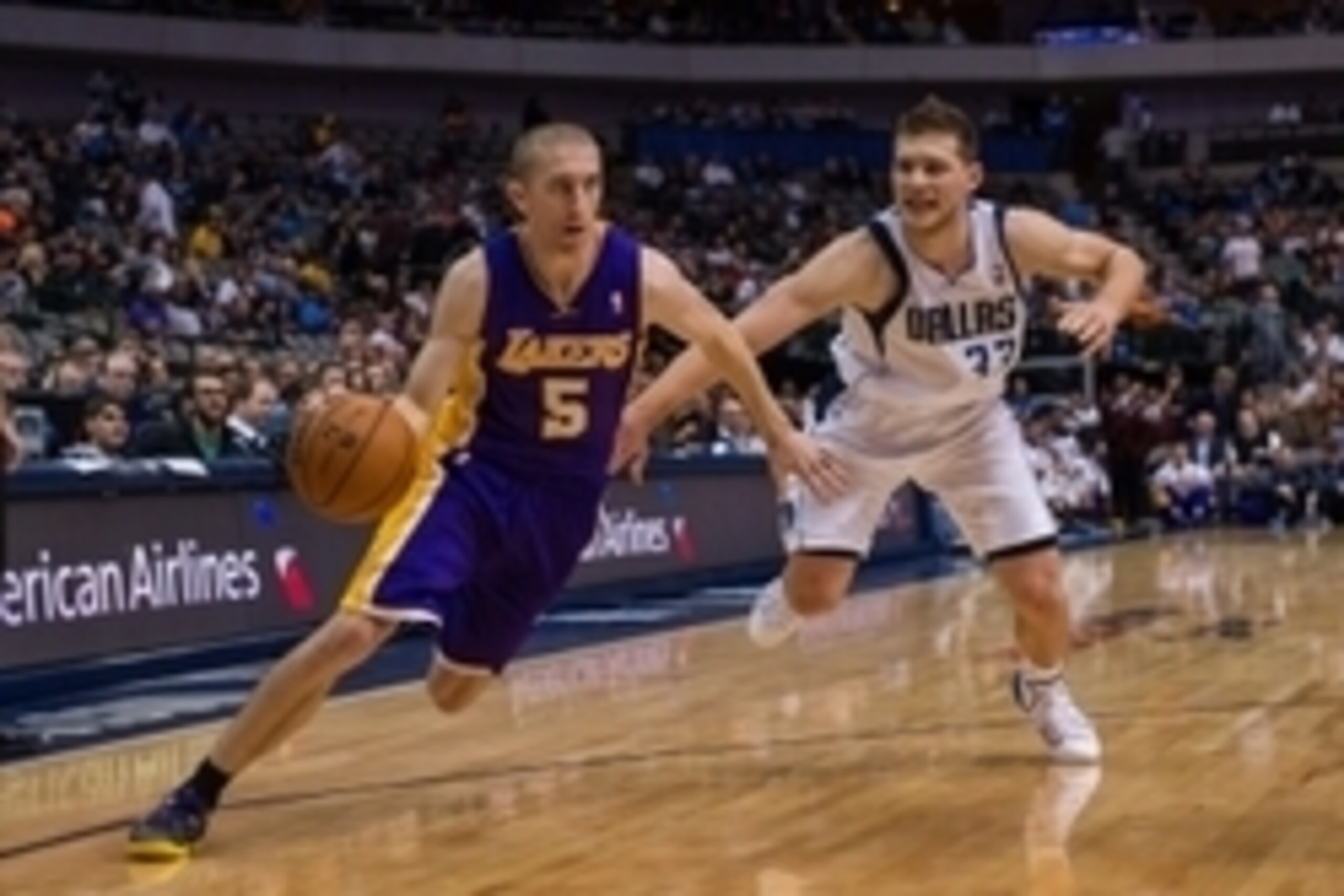 Nov 5, 2013; Dallas, TX, USA; Los Angeles Lakers point guard Steve Blake (5) drives to the basket past Dallas Mavericks point guard Gal Mekel (33) during the game at the American Airlines Center. The Mavericks defeated the Lakers 123-104. Mandatory Credi Nov 5, 2013; Dallas, TX, USA; Los Angeles Lakers point guard Steve Blake (5) drives to the basket past Dallas Mavericks point guard Gal Mekel (33) during the game at the American Airlines Center. The Mavericks defeated the Lakers 123-104. Mandatory Credi