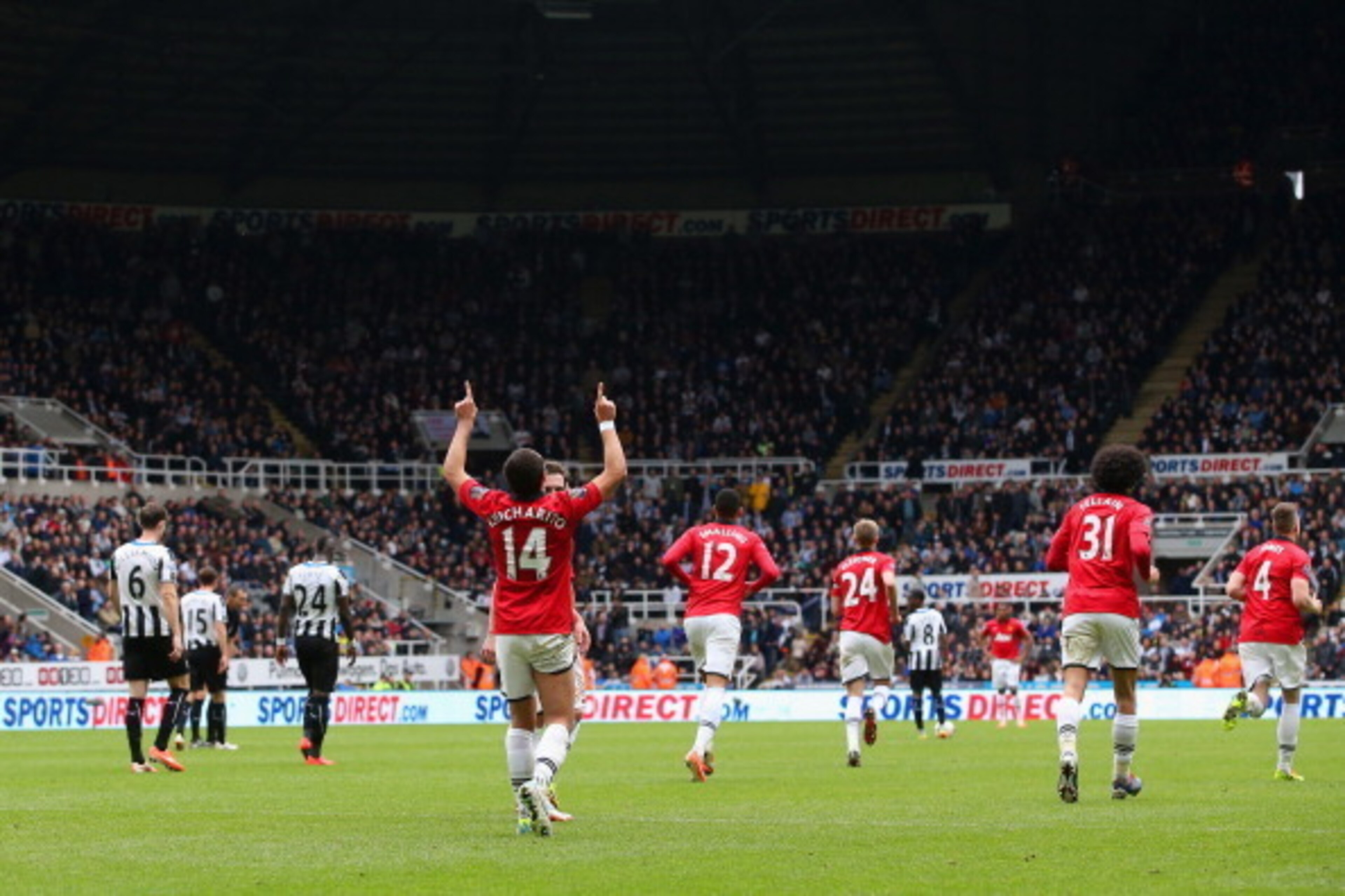 NEWCASTLE UPON TYNE, ENGLAND - APRIL 05: Javier Hernandez of Manchester United celebrates scoring their third goal during the Barclays Premier League match between Newcastle United and Manchester United at St James' Park on April 5, 2014 in Newcastle up NEWCASTLE UPON TYNE, ENGLAND - APRIL 05: Javier Hernandez of Manchester United celebrates scoring their third goal during the Barclays Premier League match between Newcastle United and Manchester United at St James' Park on April 5, 2014 in Newcastle up