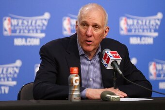 OKLAHOMA CITY, OK - MAY 31:  Gregg Popovich of the San Antonio Spurs talks with the media after the Spurs beat the Oklahoma Thunder 112-107 in Game Six of the Western Conference Finals of the 2014 NBA Playoffs at Chesapeake Energy Arena on May 31, 2014 in