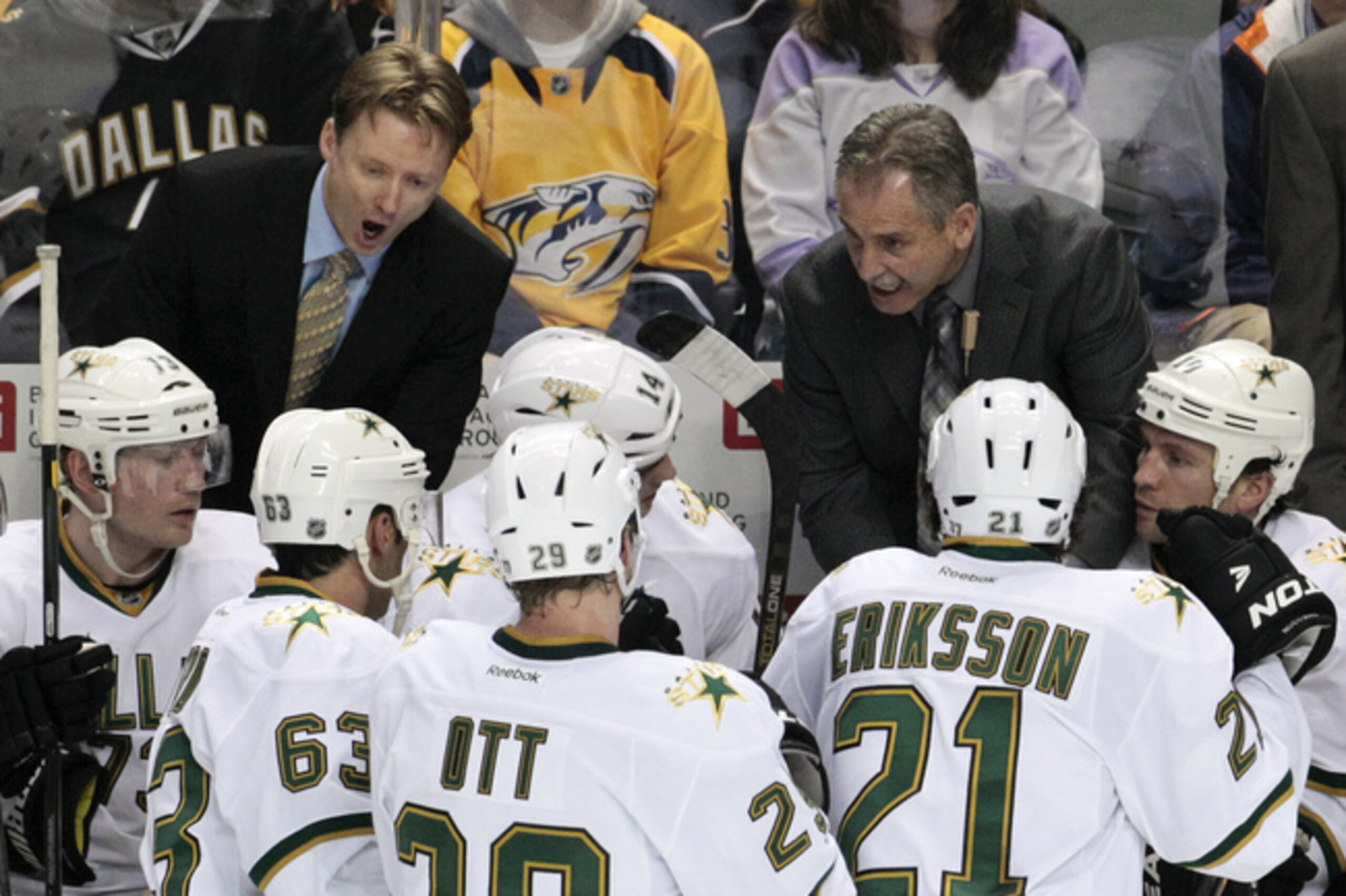 Desjardins (coach on right) on the Stars' bench in 2010.