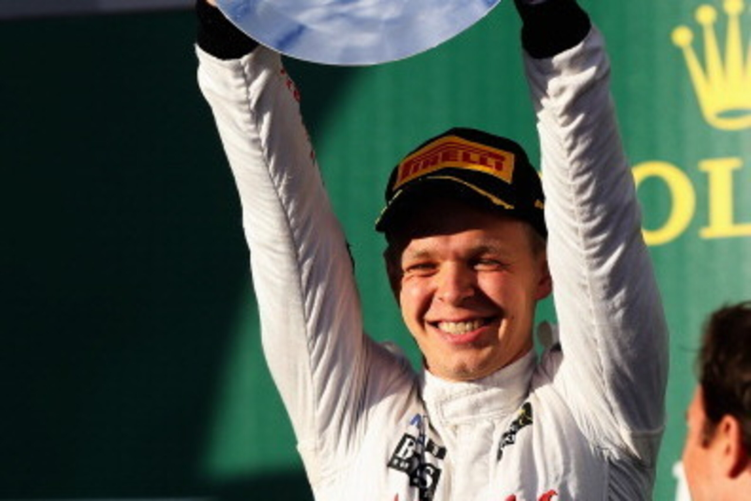 MELBOURNE, AUSTRALIA - MARCH 16: Kevin Magnussen of Denmark and McLaren celebrates on the podium after finishing third during the Australian Formula One Grand Prix at Albert Park on March 16, 2014 in Melbourne, Australia. (Photo by Mark Thompson/Getty I MELBOURNE, AUSTRALIA - MARCH 16: Kevin Magnussen of Denmark and McLaren celebrates on the podium after finishing third during the Australian Formula One Grand Prix at Albert Park on March 16, 2014 in Melbourne, Australia. (Photo by Mark Thompson/Getty I