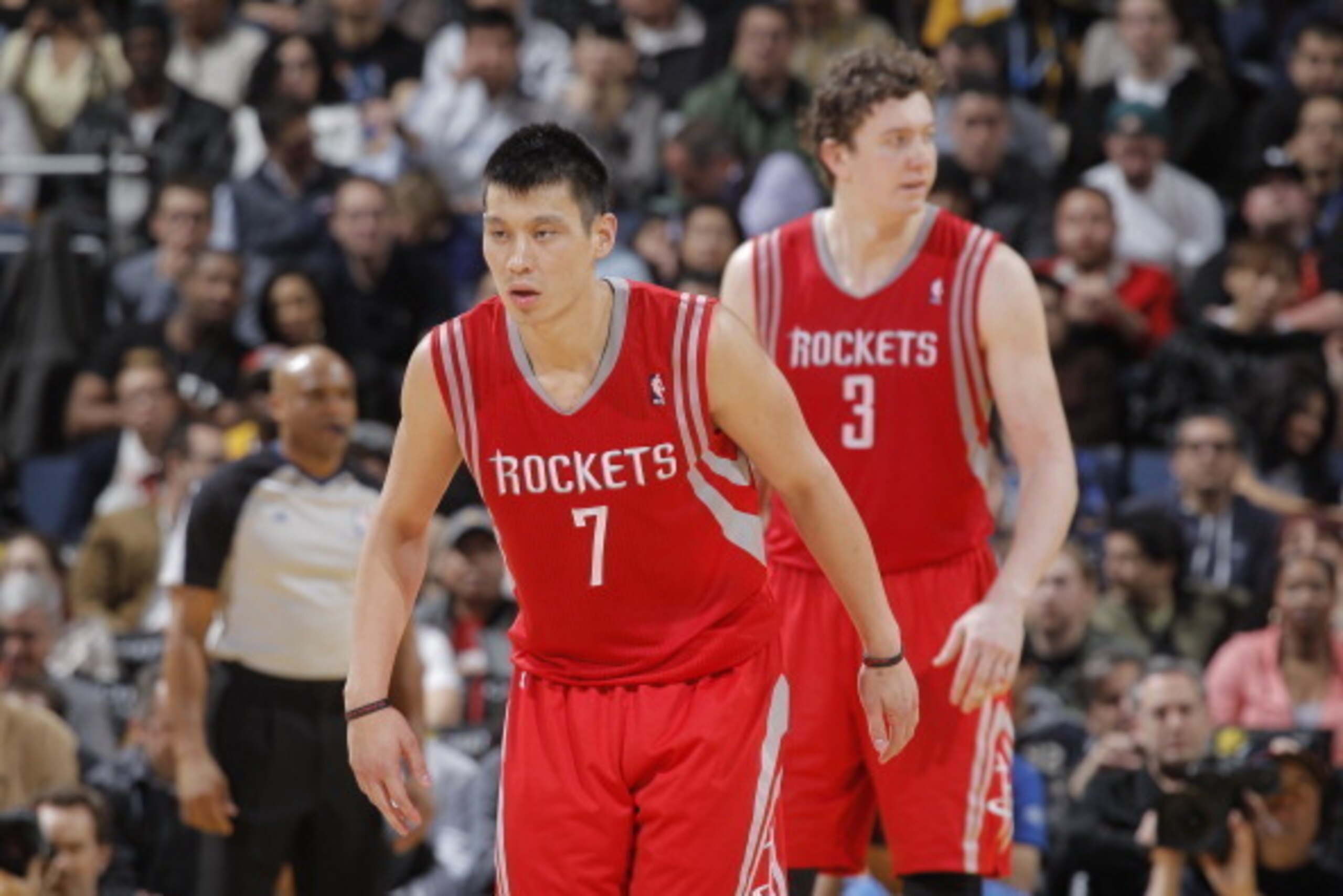 OAKLAND, CA - FEBRUARY 12:  Jeremy Lin #7 and Omer Asik #3 of the Houston Rockets in a game against the Golden State Warriors on February 12, 2013 at Oracle Arena in Oakland, California. NOTE TO USER: User expressly acknowledges and agrees that, by downlo