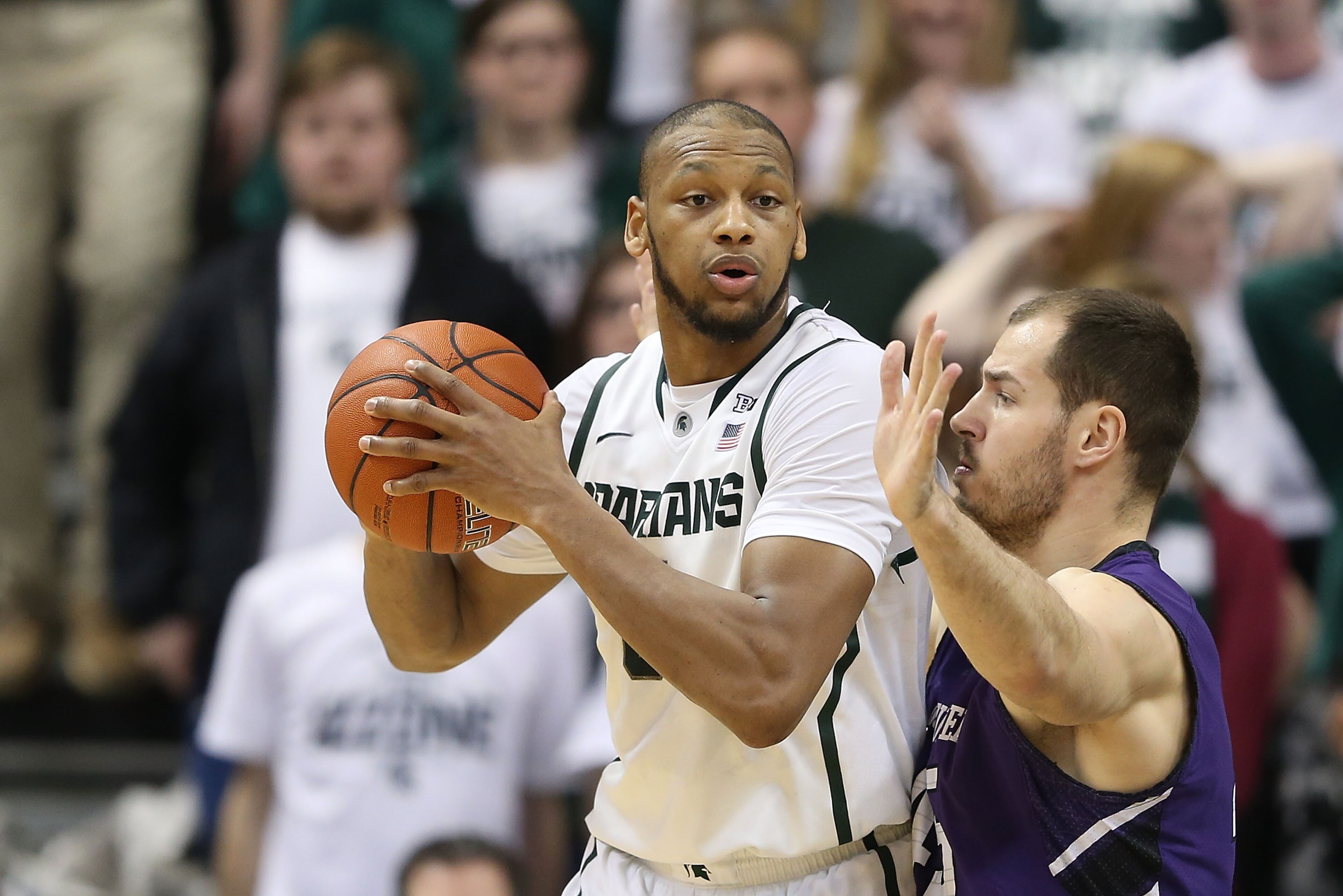EAST LANSING, MI - FEBRUARY 13:  Adreian Payne #5 of the Michigan State Spartans looks to pass the ball during the first half of the game against the  Northwestern Wildcats at Breslin Center on February 13, 2014 in East Lansing, Michigan. The Spartans def