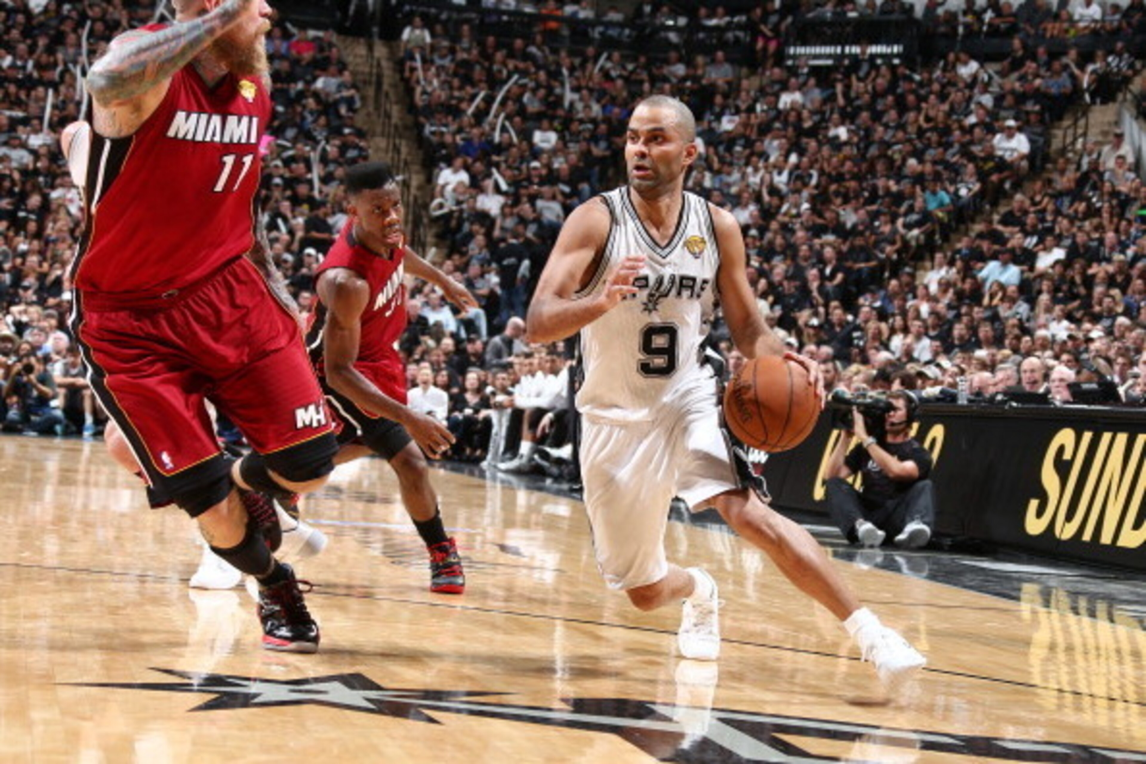 SAN ANTONIO, TX - JUNE 5: Tony Parker #9 of the San Antonio Spurs drives against Chris Andersen #11 of the Miami Heat in Game One of the 2014 NBA Finals at AT&T Center on June 5, 2014 in San Antonio, Texas. NOTE TO USER: User expressly acknowledges and ag