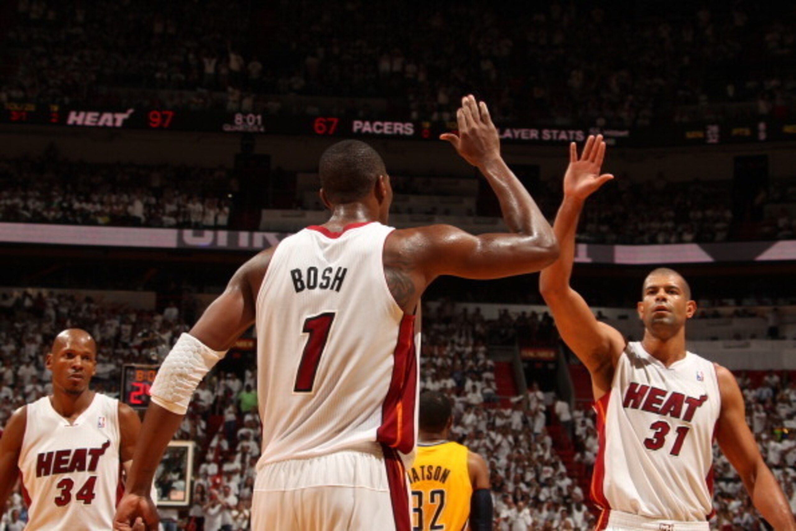 MIAMI, FL - MAY 30: Chris Bosh #1 of the Miami Heat celebrates against the Indiana Pacers in Game Six of the Eastern Conference Finals during the 2014 NBA Playoffs on May 30, 2014 in Miami, Fl. NOTE TO USER: User expressly acknowledges and agrees that, by MIAMI, FL - MAY 30: Chris Bosh #1 of the Miami Heat celebrates against the Indiana Pacers in Game Six of the Eastern Conference Finals during the 2014 NBA Playoffs on May 30, 2014 in Miami, Fl. NOTE TO USER: User expressly acknowledges and agrees that, by