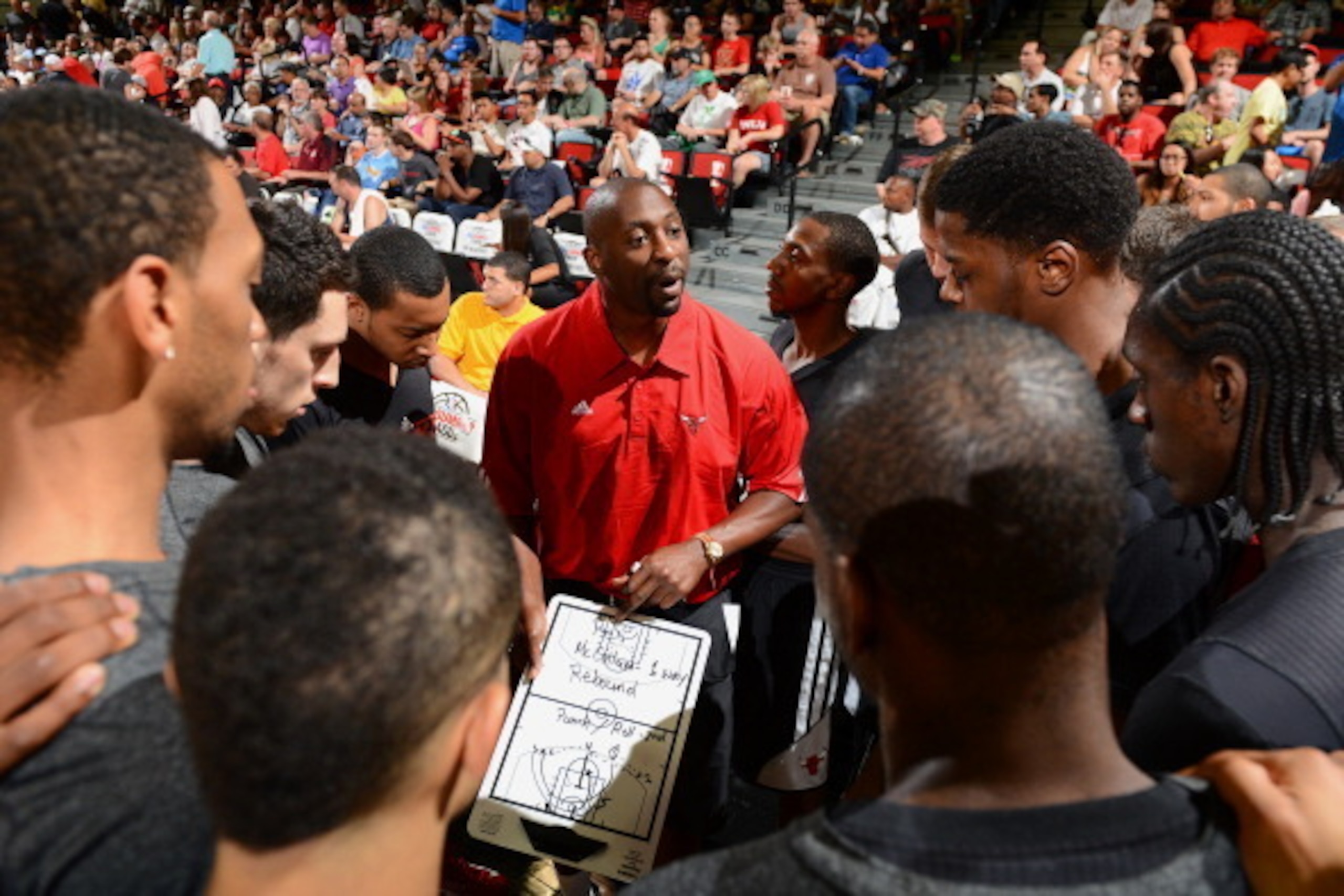 LAS VEGAS, NV - JULY 16:  Summer League Head Coach of the Chicago Bulls Adrian Griffin gathers his team during NBA Summer League game between the Chicago Bulls and the Portland Trail Blazers on July 16, 2013 at the Cox Pavilion in Las Vegas, Nevada. NOTE 