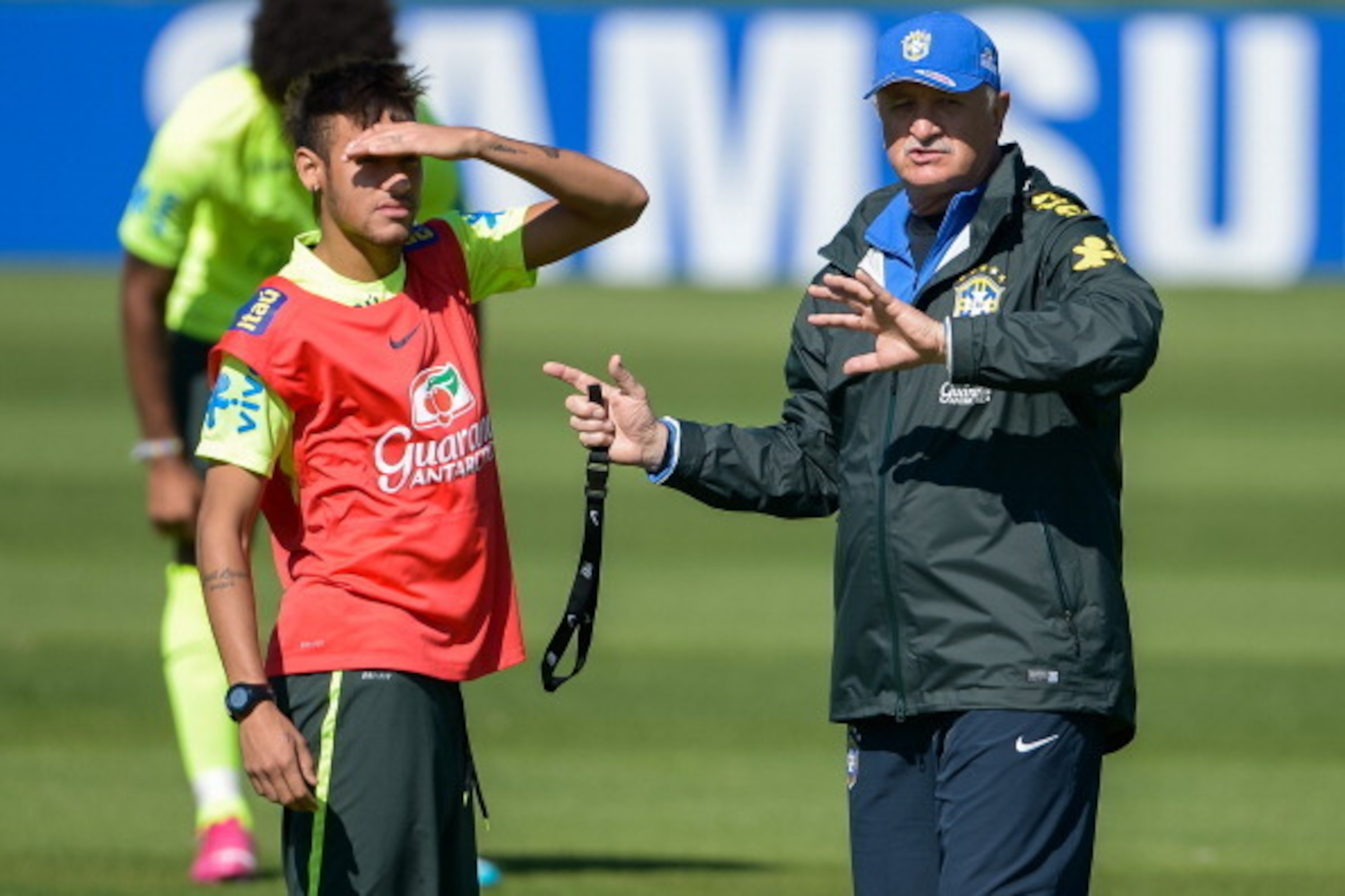 TERESOPOLIS, BRAZIL - JUNE 05: Head coach Luiz Felipe Scolari (L) speaks with a Neymar during a training session of the Brazilian national football team at the squad's Granja Comary training complex, in Teresopolis, 90 km from downtown Rio de Janeiro on J