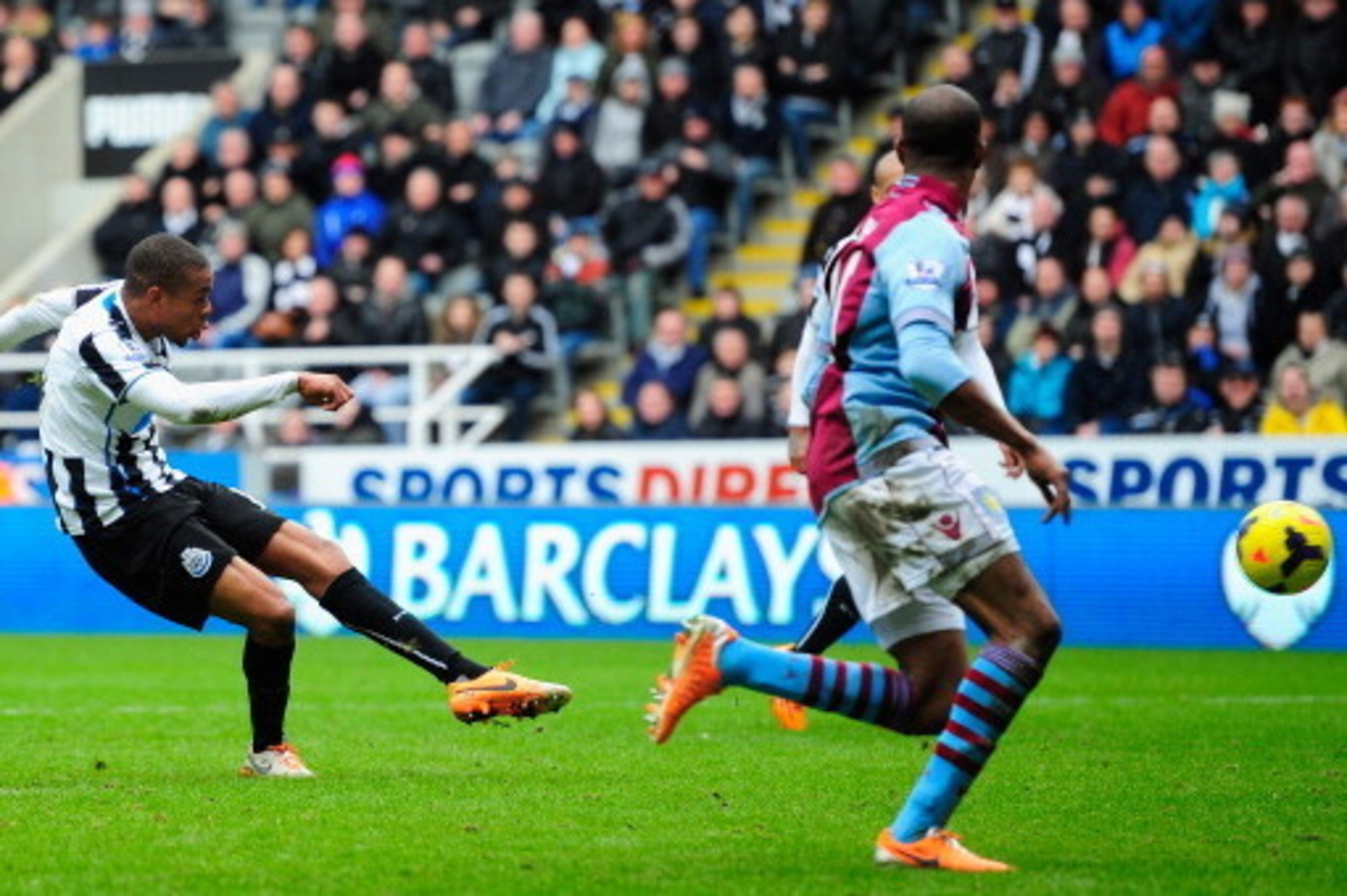 NEWCASTLE UPON TYNE, ENGLAND - FEBRUARY 23:  Newcastle player Loic Remy scores the winning goal during the Barclays Premier League match between Newcastle United and  Aston Villa at St James' Park on February 23, 2014 in Newcastle upon Tyne, England.  (Ph