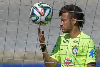 TERESOPOLIS, BRAZIL - JUNE 05: Neymar in action during a training session of the Brazilian national football team at the squad's Granja Comary training complex, in Teresopolis, 90 km from downtown Rio de Janeiro on June 05, 2014 in Teresopolis, Brazil. (P
