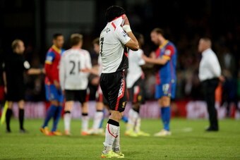 LONDON, ENGLAND - MAY 05:  A dejected Luis Suarez of Liverpool reacts following his team's 3-3 draw during the Barclays Premier League match between Crystal Palace and Liverpool at Selhurst Park on May 5, 2014 in London, England.  (Photo by Jamie McDonald